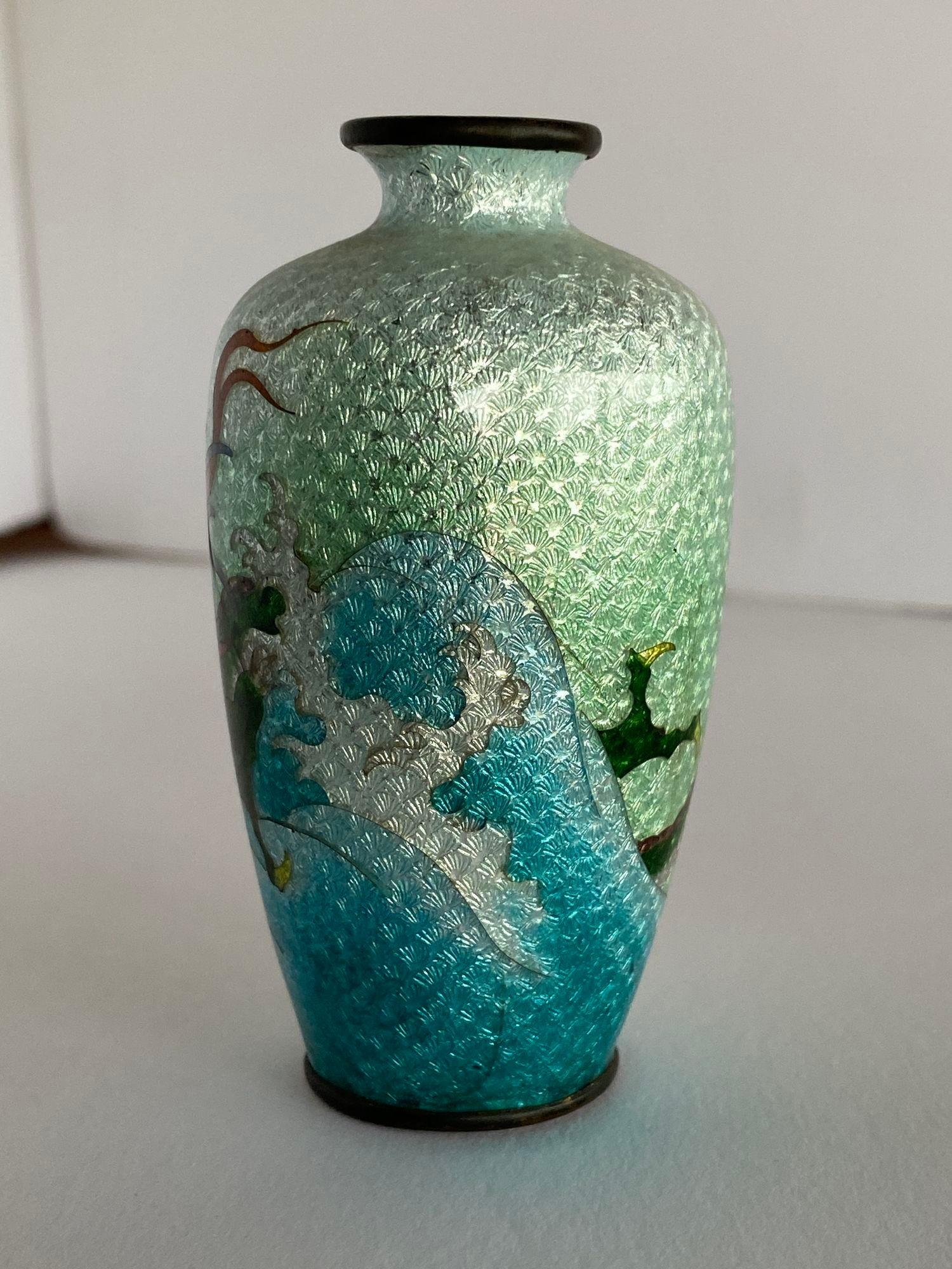 Post War Brass Japanese Dragon Cloisonné Vase with scenic of a dragon flying through the sky.
 
 
Crica 1900
dimensions are 4.25