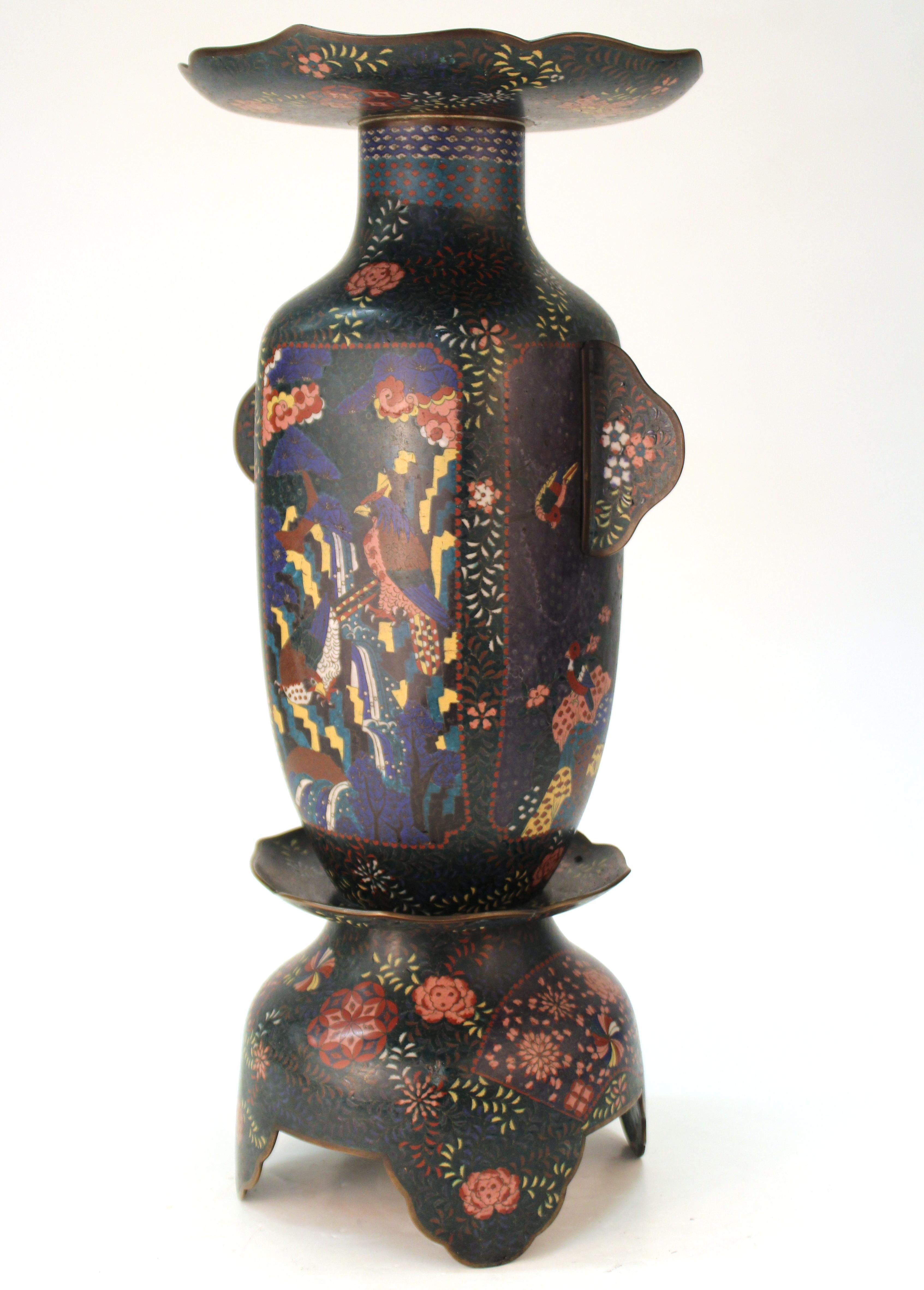 Japanese vase with enamel cloisonné depicting naturalistic scenes with birds on one side and with fish on the other from the late Meiji period, circa 1900. The piece is in great condition with age-appropriate wear and some minor loss on one foot.