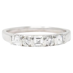 Late Mid-Century 0.70 Carat Diamond Platinum Band Ring
