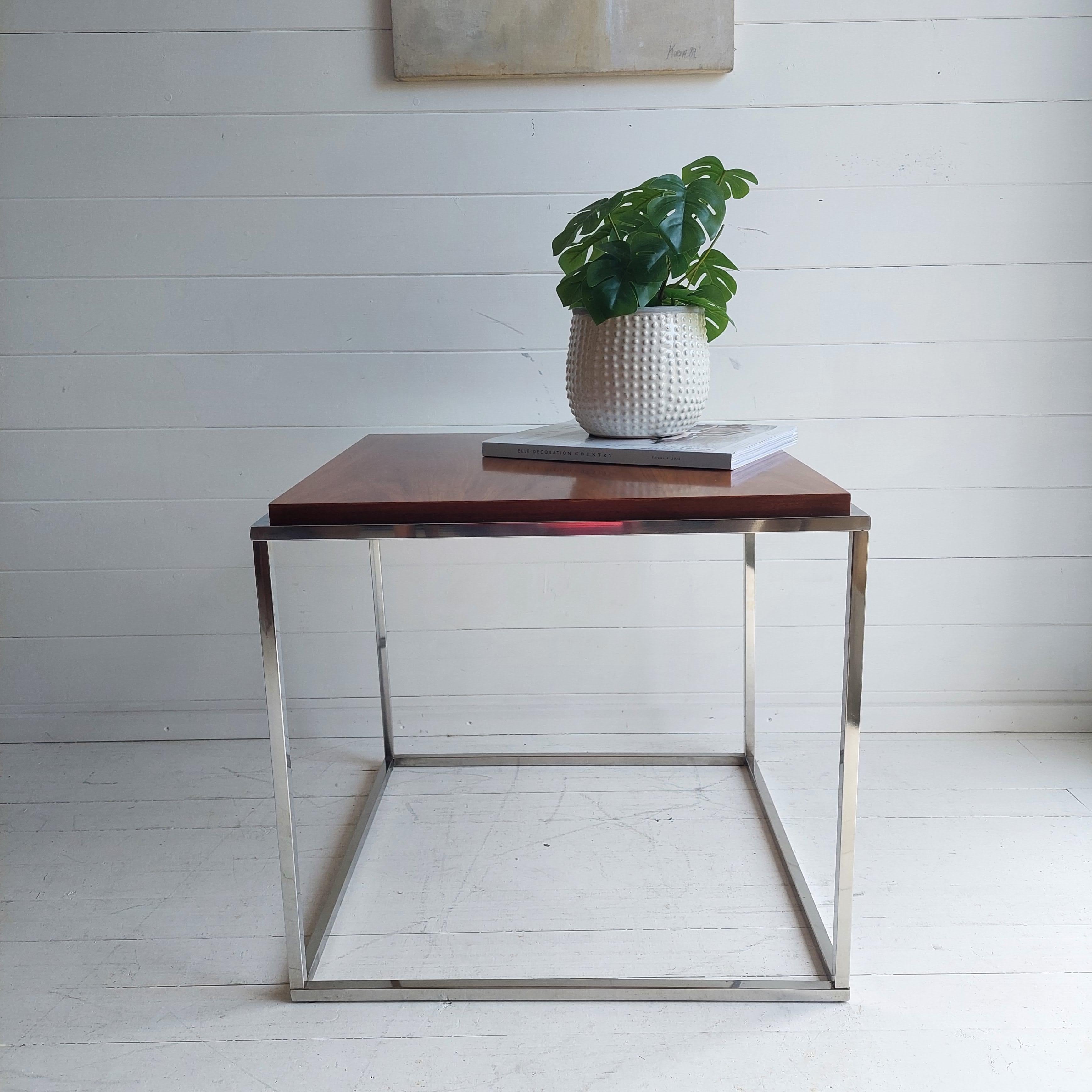 Retro . Mid century . Vintage
Stunning and stylish design

A fabulous teak top and chrome frame cube coffee table ....great for any entertaining room ..and super stylish too .
Designed under Mid-Century Modern Knoll furniture style
A simplistic