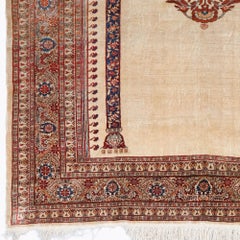 Tapis en soie à motifs floraux, datant de la fin du XIXe siècle