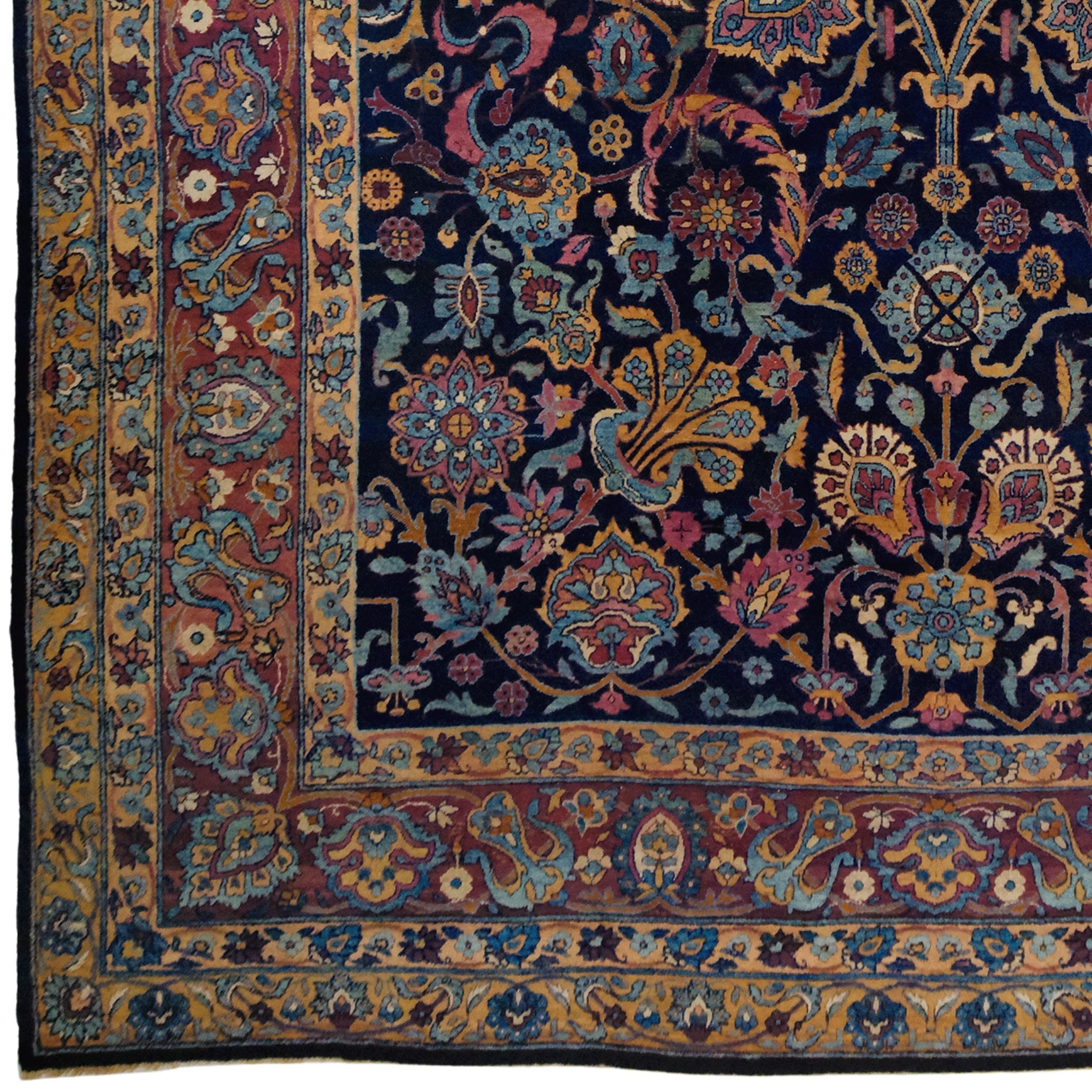 Here is a rare Yazd carpet from the late 19th century. This unique carpet is a handmade work of art that reflects Iran's historical and cultural heritage.

The magnificent harmony of dazzling blue, red, and gold colors gives this carpet its