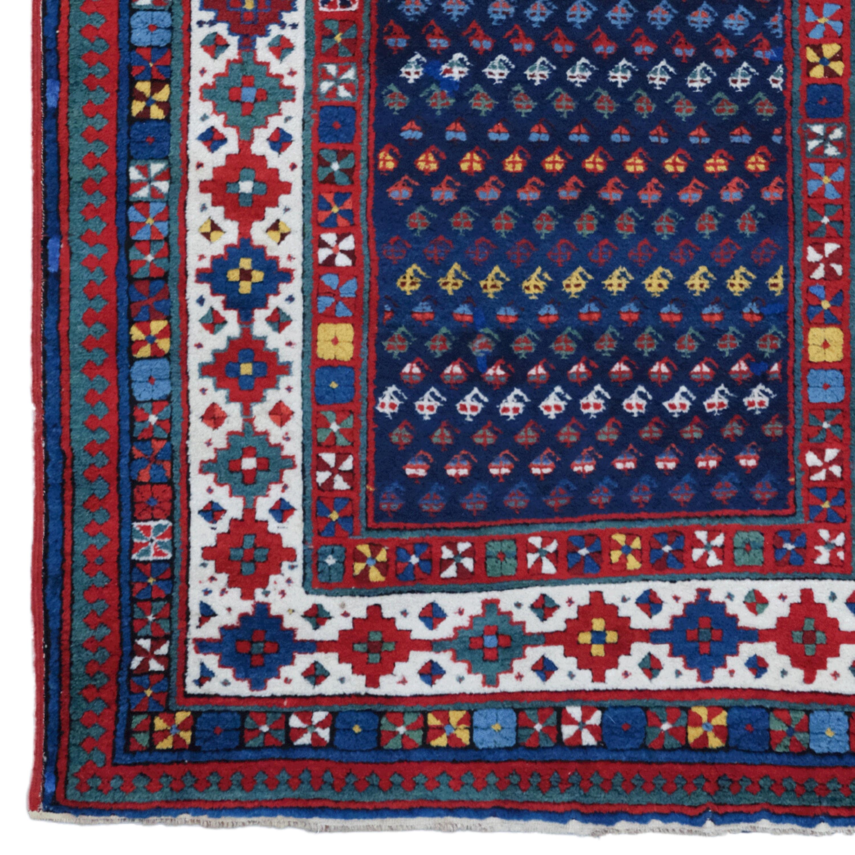 Tapis caucasien Talish de la fin du 19e siècle

Ce tapis Talish caucasien antique du XIXe siècle se distingue par son champ central d'un bleu profond et ses motifs géométriques aux couleurs vives.

Design/One : La zone centrale d'un bleu profond est