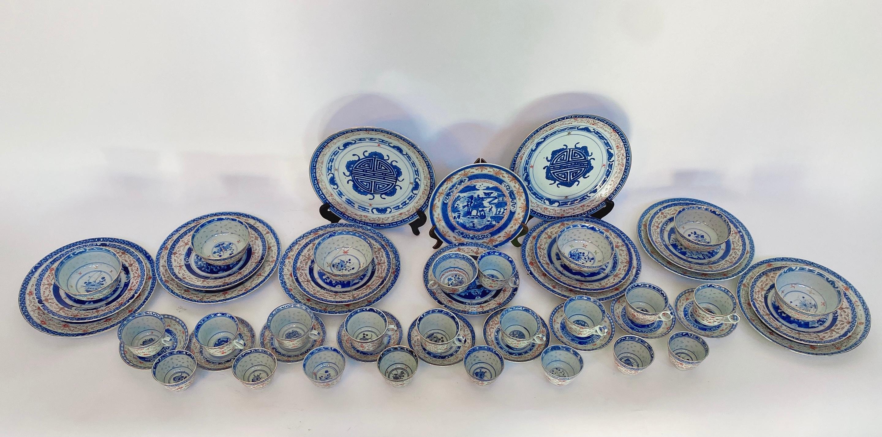 Early of 20 century late Qing dynasty 50 pieces Chinese rice -pattern decorated porcelain sets, 8 pieces 24cm big plates, 8 pieces 19.5 cm plates, 6 pieces 11cm x 5cm rice bowls, 11 pieces 7.5cm x 6cm tea cups, 9 pieces 12cm x 2cm tea cups dishes, 8