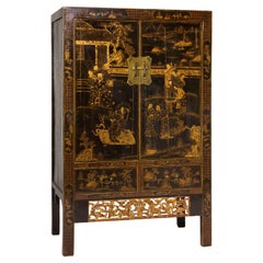 Late Qing Dynasty Black Lacquer Elm Cabinet with Gilt Motifs and Carved Apron