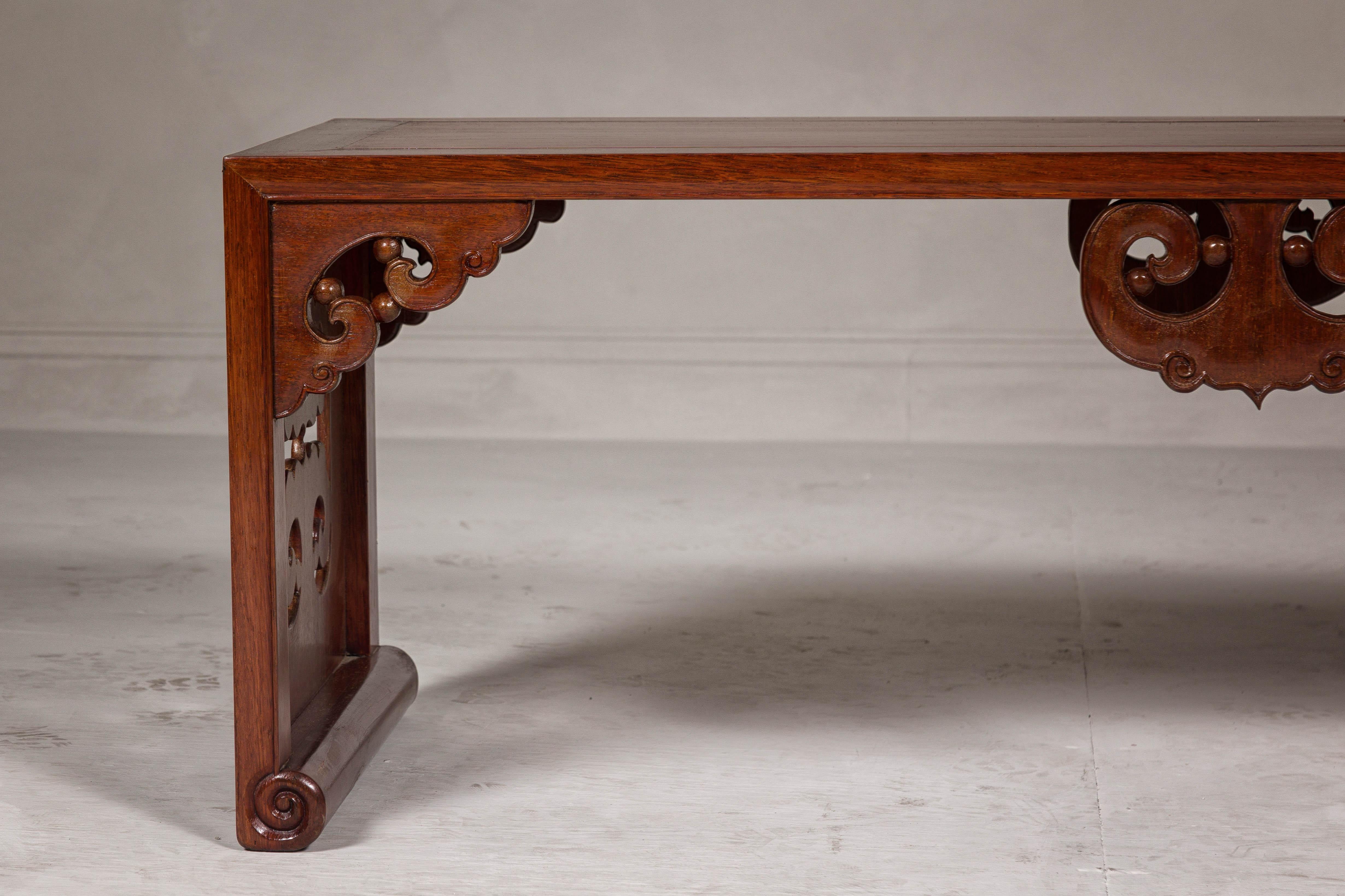Late Qing Dynasty Brown Lacquered Coffee Table with Openwork Cloud Motifs For Sale 3
