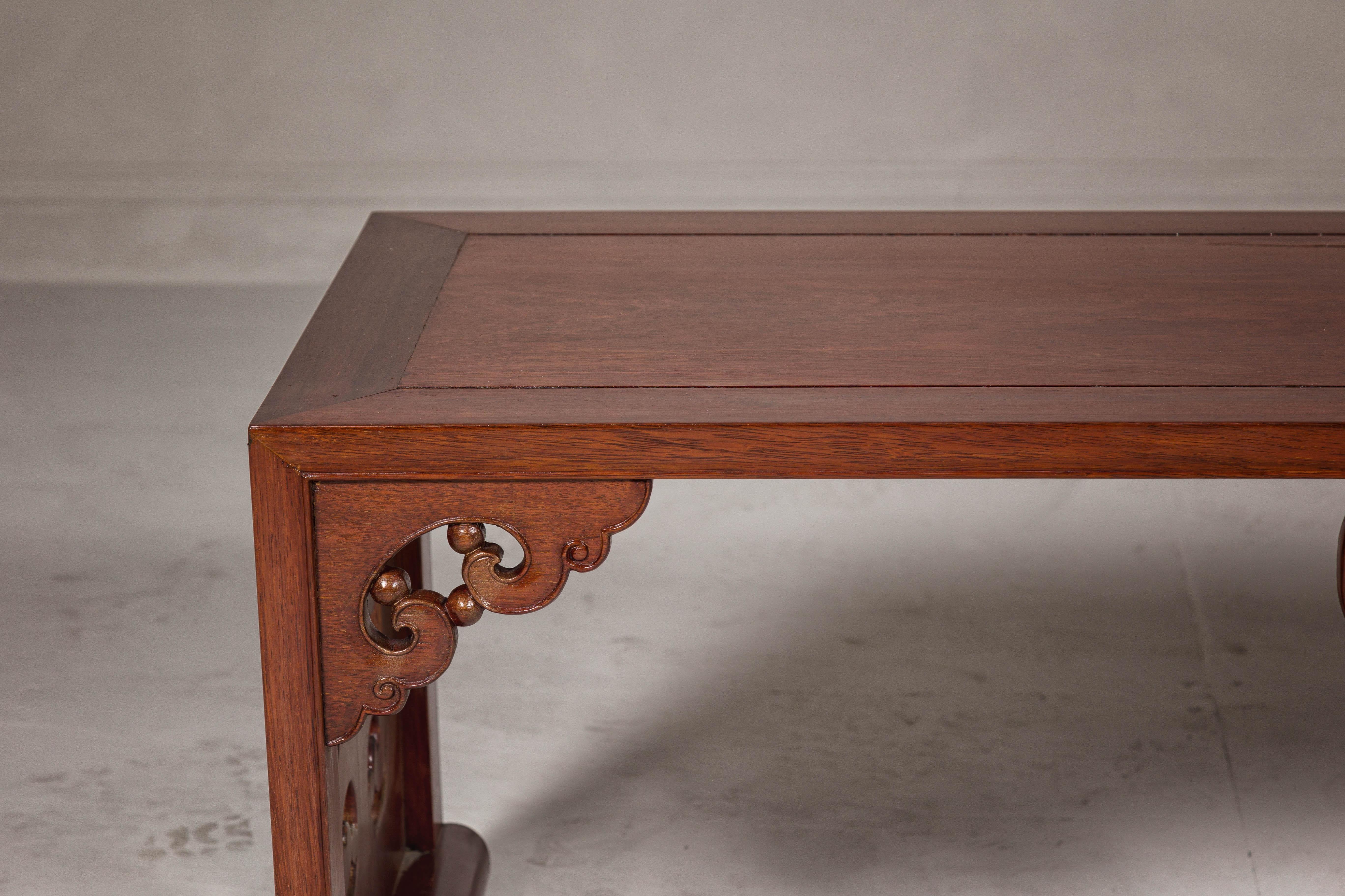 Late Qing Dynasty Brown Lacquered Coffee Table with Openwork Cloud Motifs For Sale 5