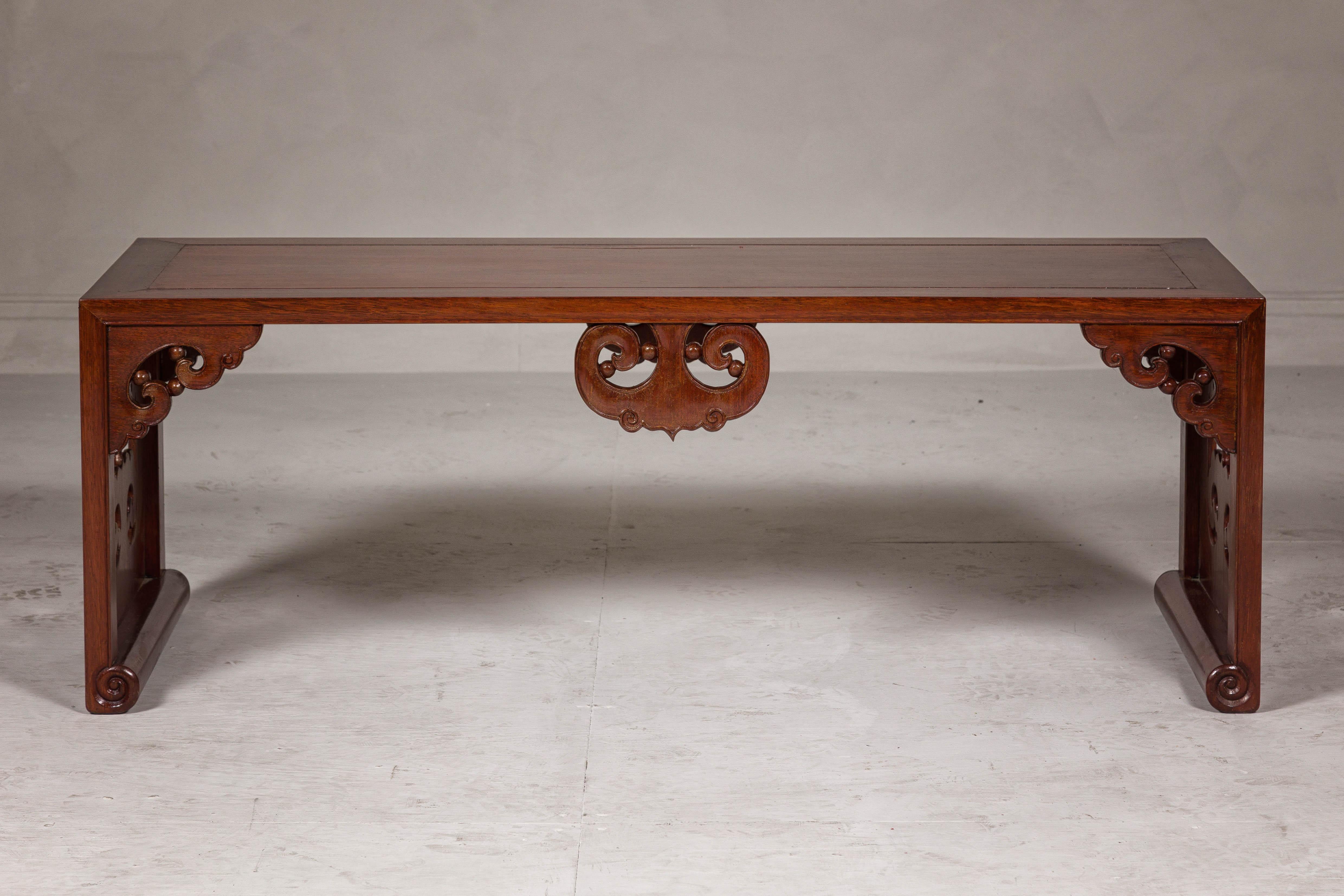 Carved Late Qing Dynasty Brown Lacquered Coffee Table with Openwork Cloud Motifs For Sale