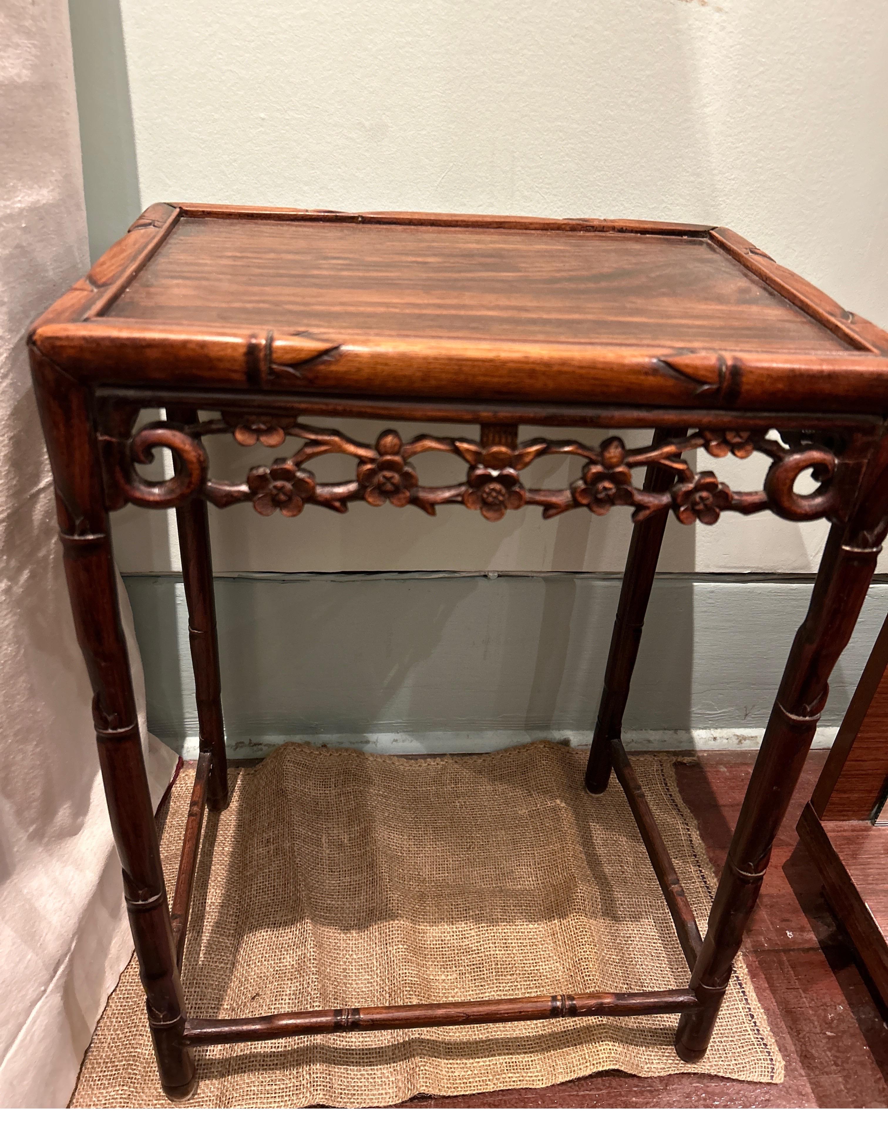 Elegant hand carved late Qing Dynasty Chinese Rosewood table with delicate carving and slender bamboo theme legs. Some chips in relief carving as seen otherwise in good original condition. Nice conversation piece to incorporate into an Asian or
