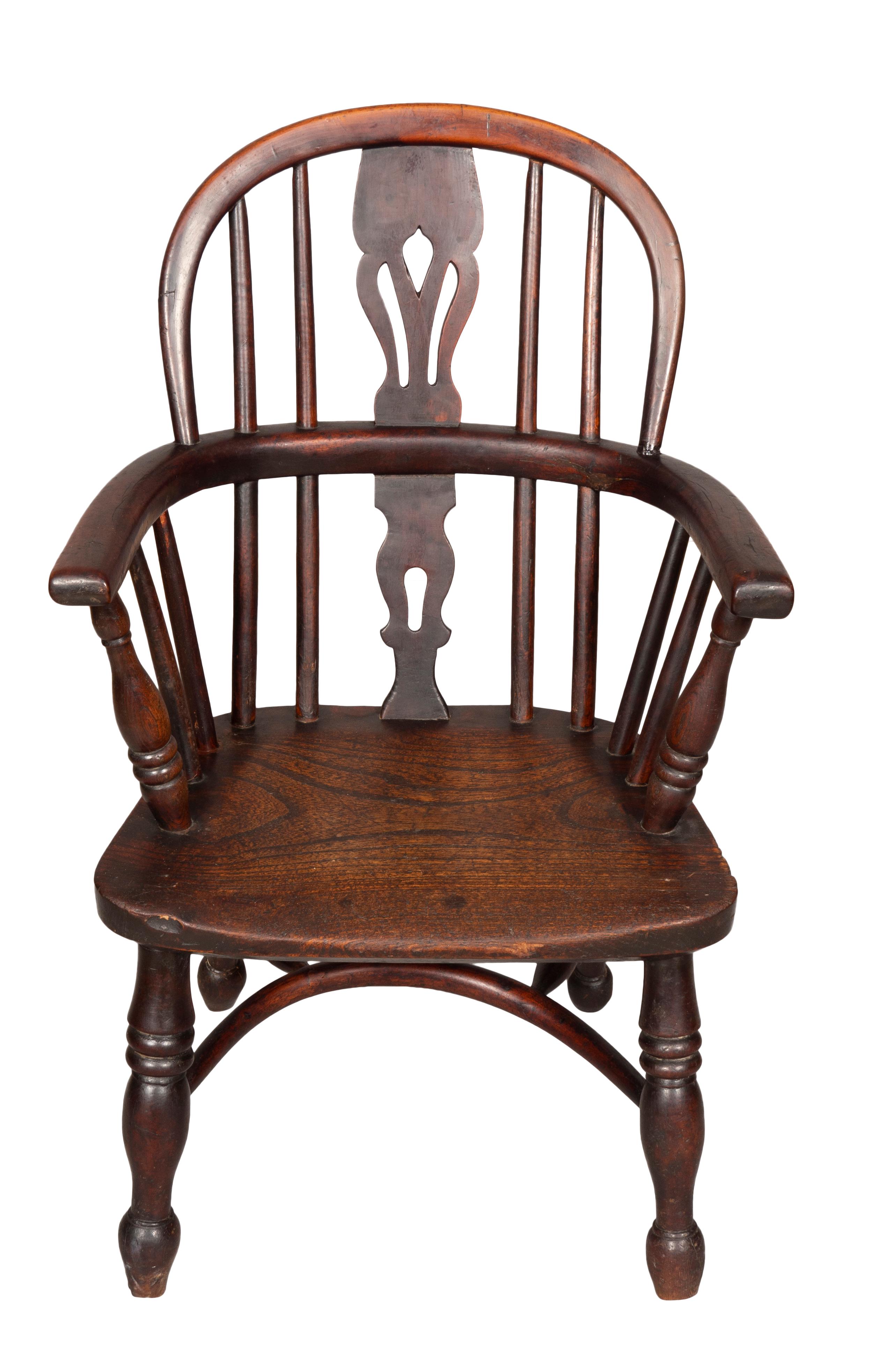Typical form with bow back and pierced baluster splat, turned legs and crinoline stretcher.