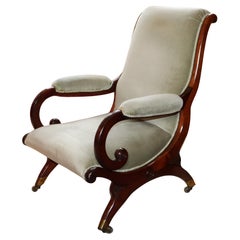 Antique Late Regency mahogany X frame library chair
