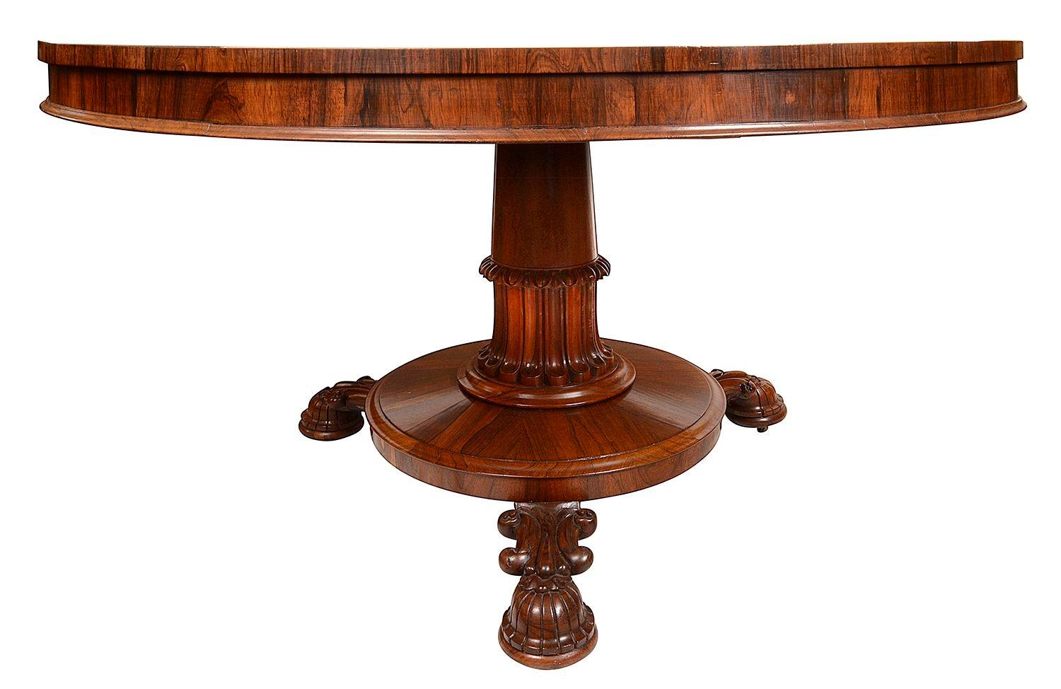 A very good quality late Regency period Rosewood circular dining / centre table. Having wonderful figured veneers to the top, raised on a circular pedestal with carved decoration, a platform terminating three carved feet, circa 1820-1840
 
Batch