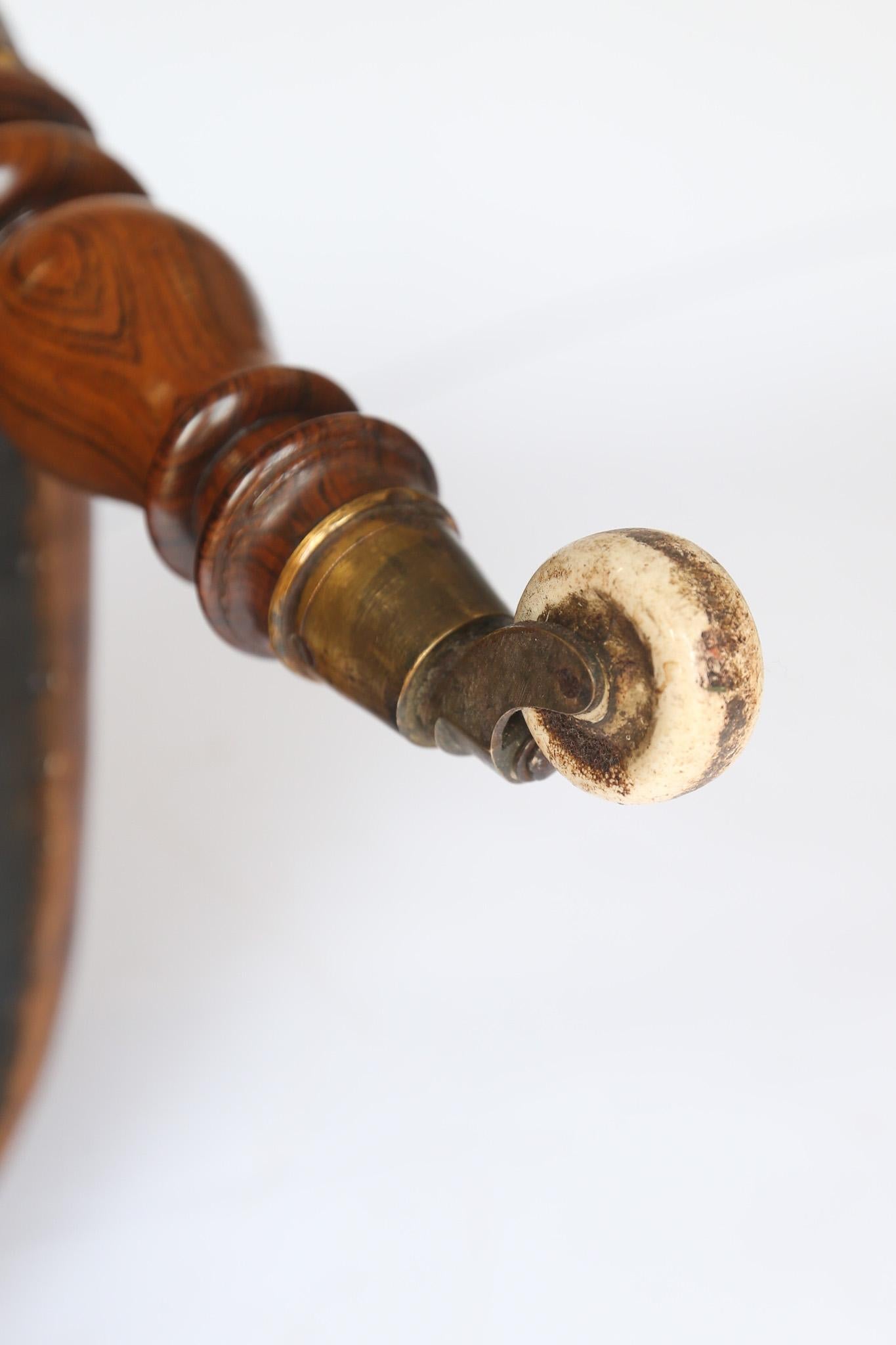 Late Regency Rosewood & Leather Library Chair
Recently upholstered with
Deep Buttoned Leather, 
Polished  & Coloured to Chestnut 
Brass stud detail
Rosewood pillars on front of arms
Rosewood legs with brass castors &
White China wheels,
Good quality