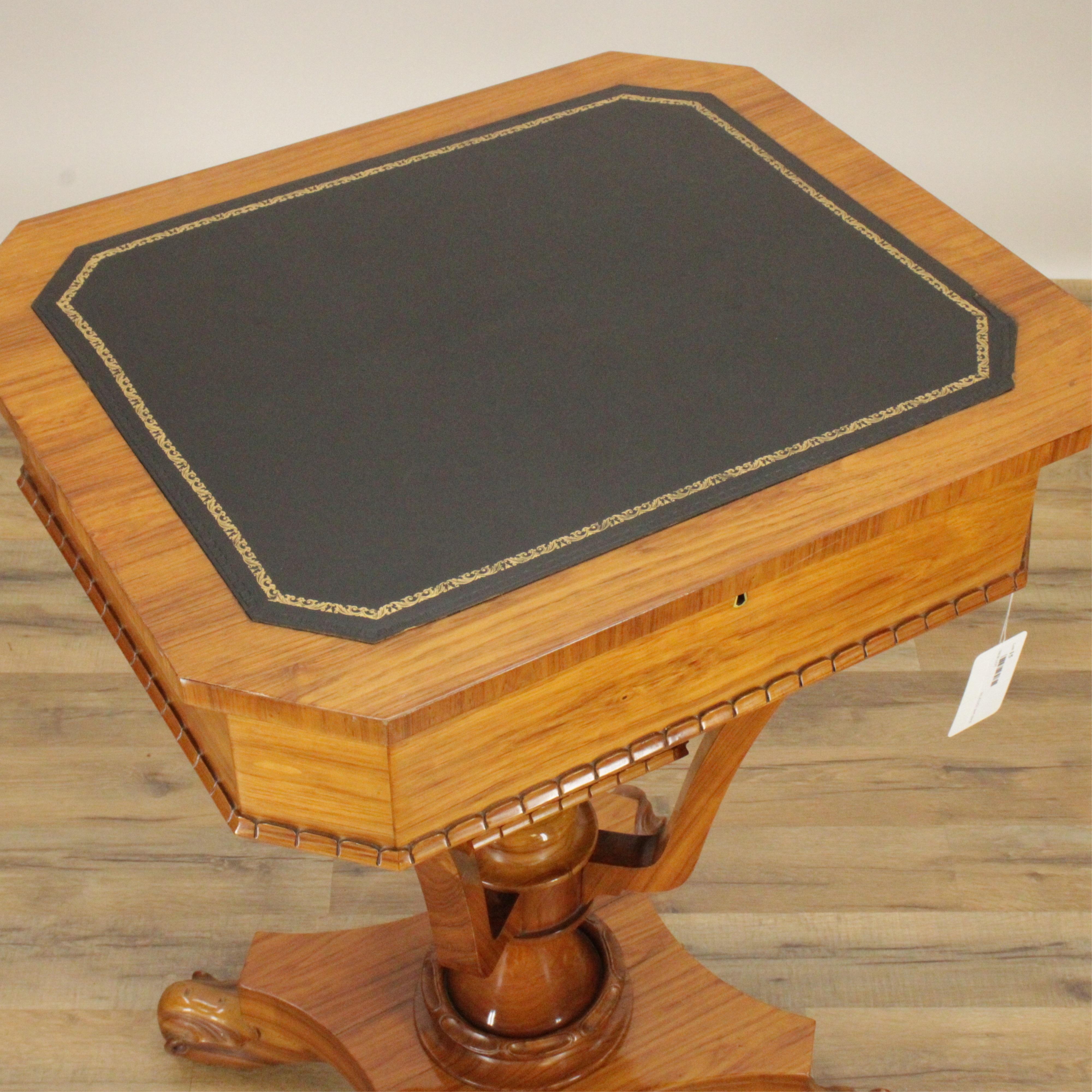 Late Regency Tulipwood and leather lift-top writing table, 19th century 
Fitted interior with reading stand
Provenance: Property from the Private Collection of Steven Stark
Measures: 30