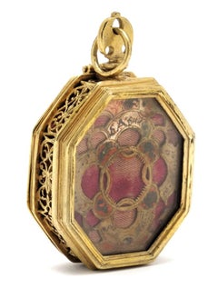 Late Renaissance Octagonal Gilded Brass Reliquary Pendant with Velvet Interior