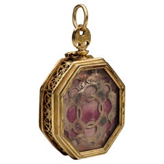 Late Renaissance Octagonal Gilded Brass Reliquary Pendant with Velvet Interior