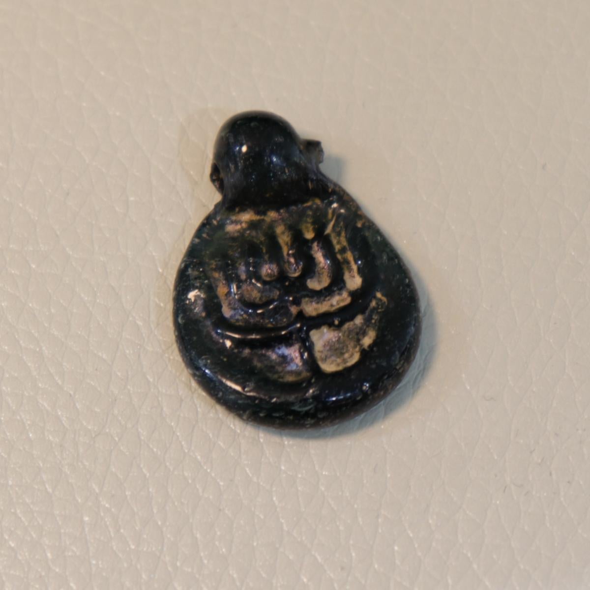 Israeli Late Roman/Byzantine Jewish Blue Glass Amulet with Menorah For Sale