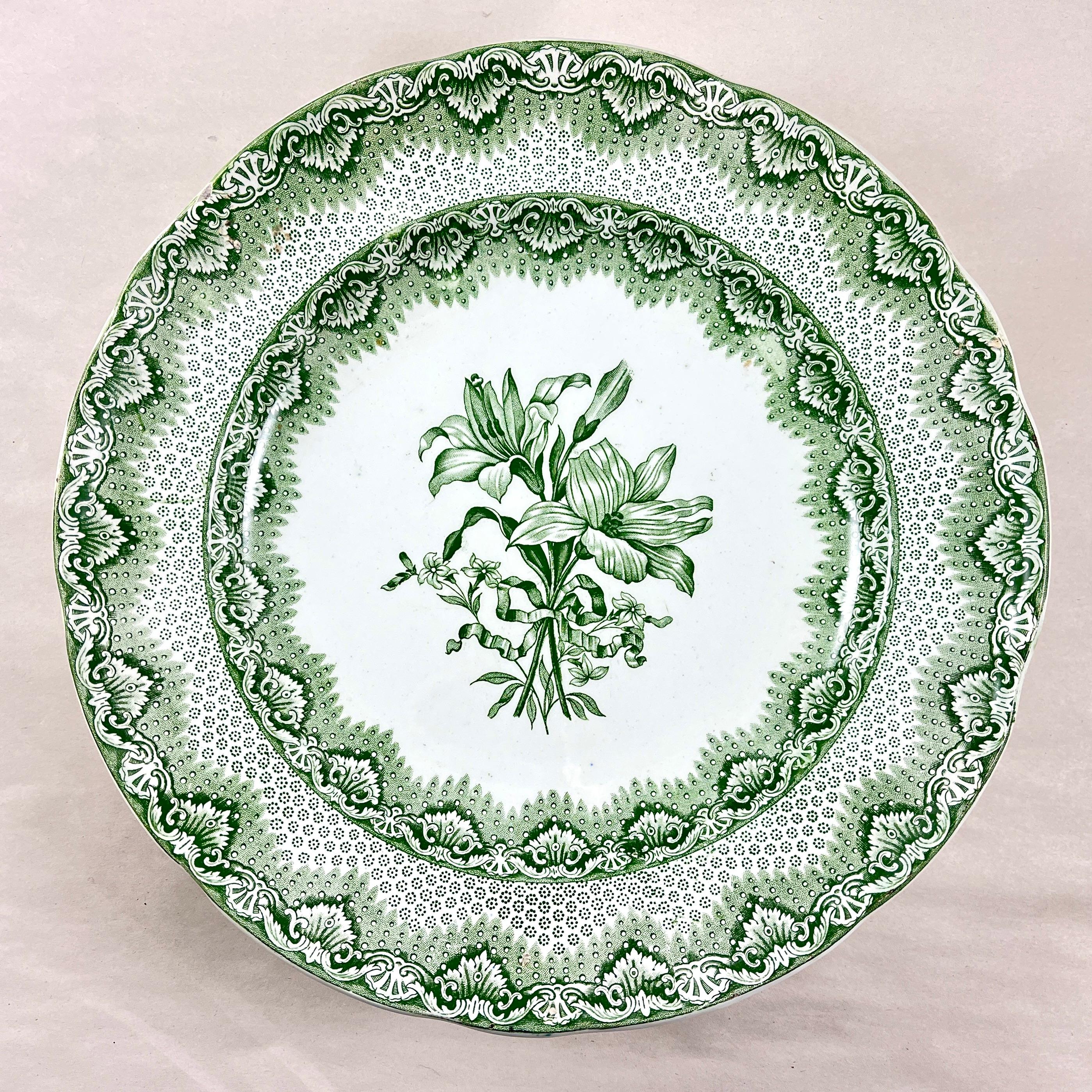 A set of six, dinner sized plates, from Copeland & Garrett, Late Spode, circa 1830s.

Copeland and Garrett operated from 1833-1847 in Stoke-on-Trent, Staffordshire, England.

The pattern is Lily – transfer printed in Green.

A detailed image of a