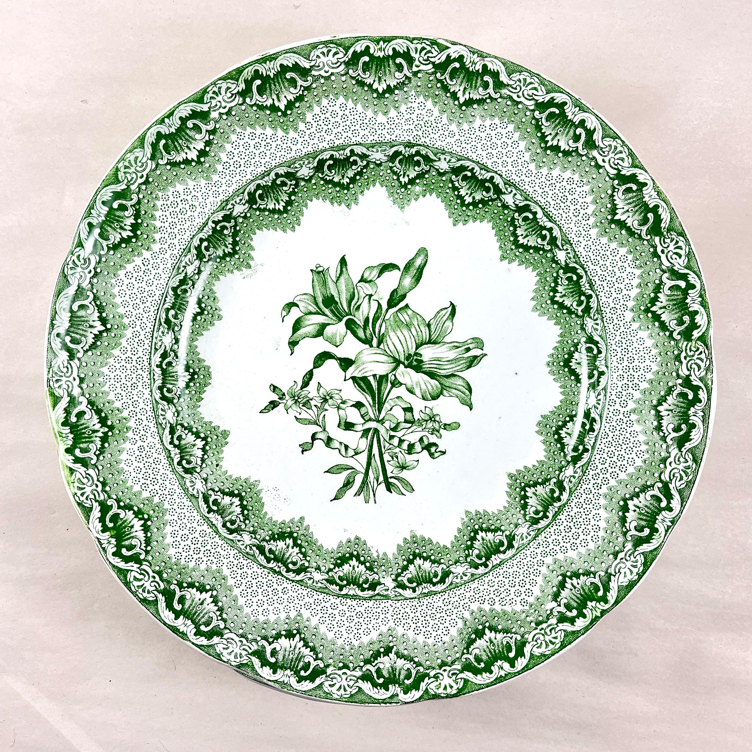 
A set of six, luncheon sized plates, from Copeland & Garrett, Late Spode, circa 1830s.

Copeland and Garrett operated from 1833-1847 in Stoke-on-Trent, Staffordshire, England.

The pattern is Lily – transfer printed in Green.

A detailed image of a