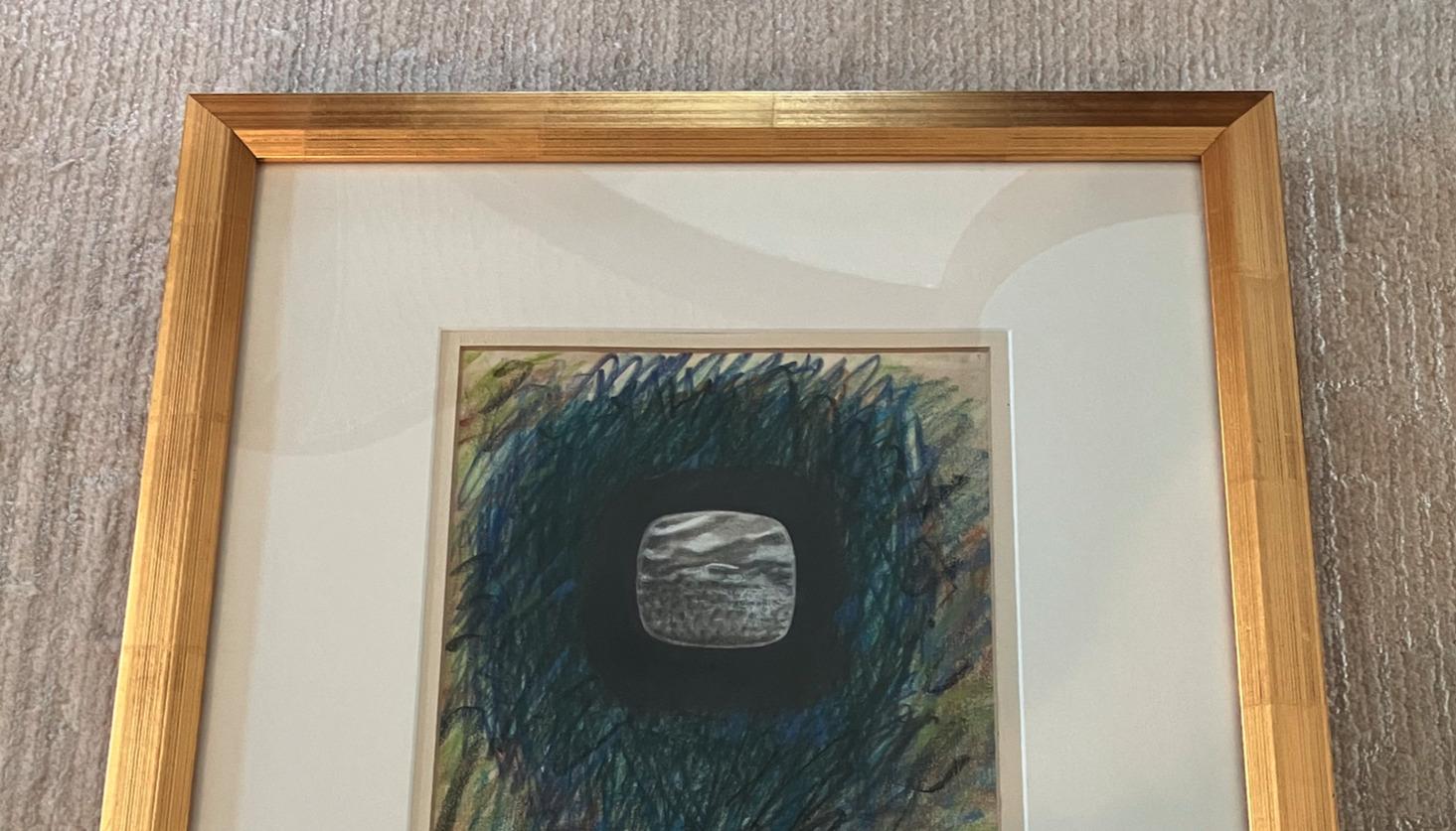 A hand signed Untitled dynamic pastel by Veronica Benning is presented in a gold contemporary frame with a clean white mat. The piece features exposed lines revealing the artist's hand in this orbital abstraction. Gestural, organic forms create a