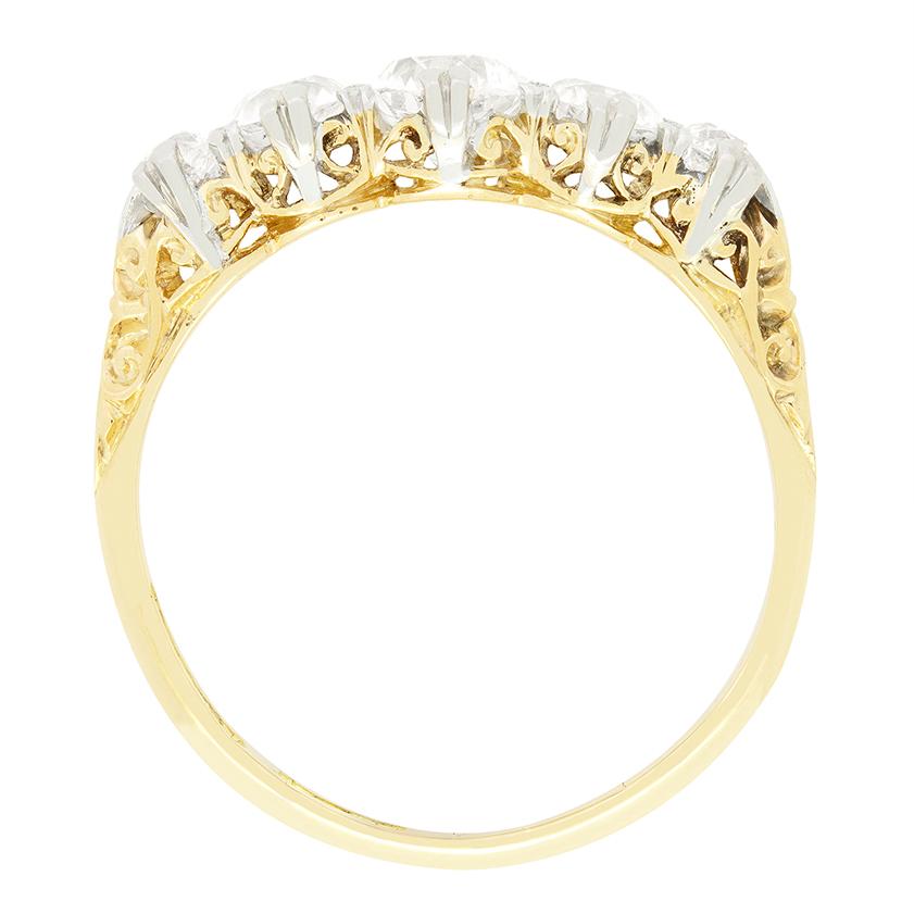 A sparkling array of five old cut diamonds are on display in this beautiful late Victorian ring. In the centre sits the largest diamond weighing 0.50 carat, flanked by two 0.25 carat stones and ending with a 0.15 carat diamond at either end. Each