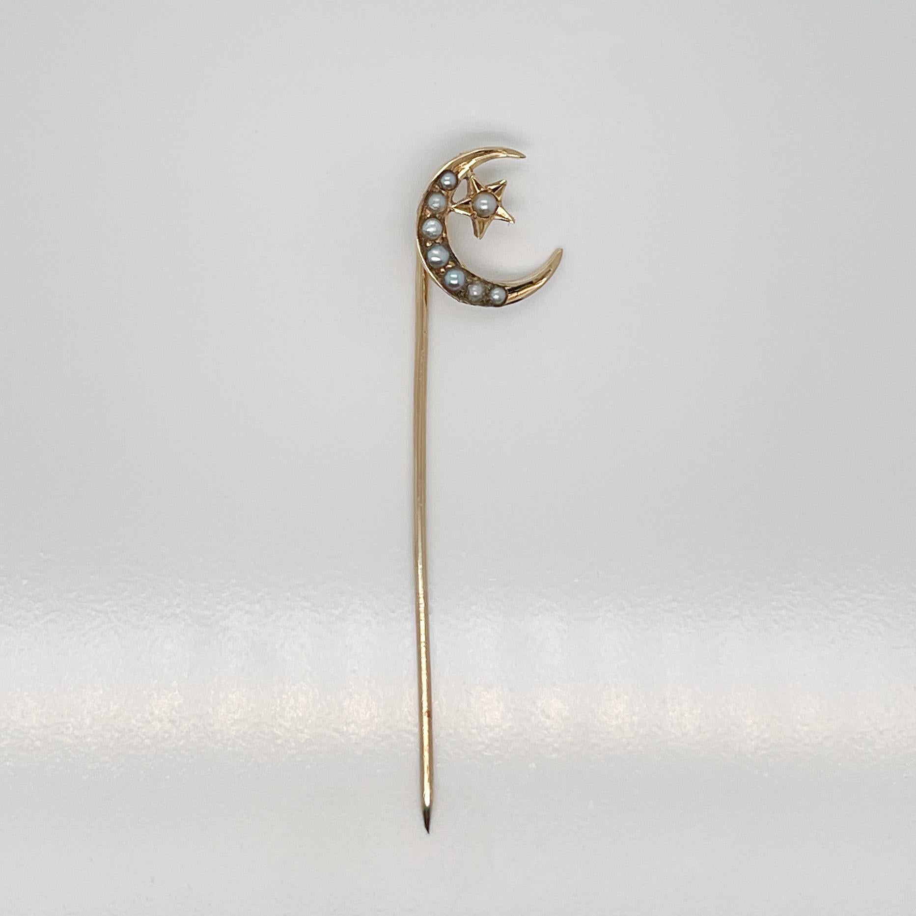 A very fine Late Victorian 14K gold and seed pearl stick pin.

With a gold moon and star prong set graduated white seed pearls.

Simply a great stickpin!

Date:
19th Century

Overall Condition:
It is in overall good, as-pictured, used estate