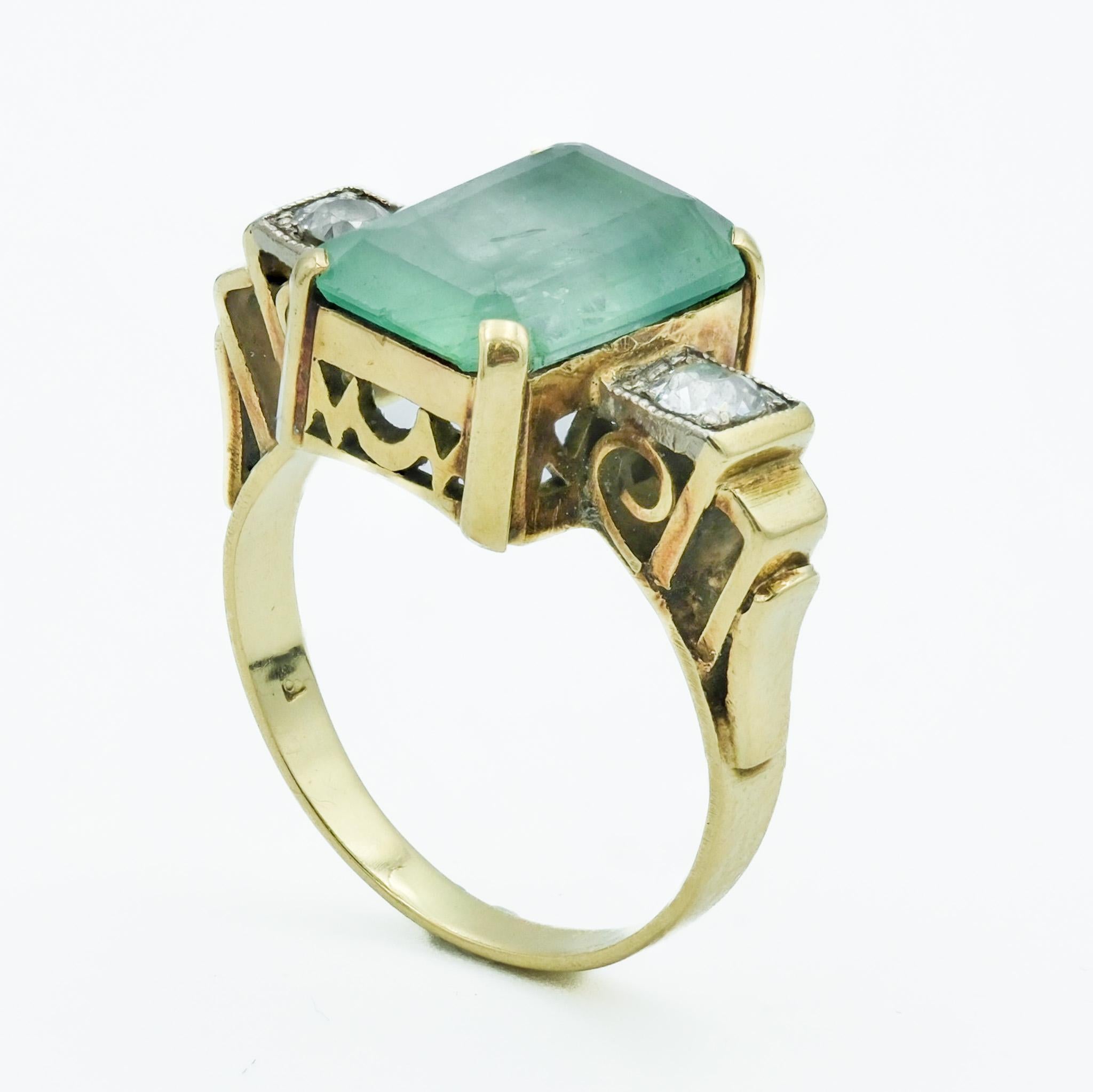 This late Victorian ring presents a robust design, featuring a central 3.18-carat emerald, set within a 14 karat yellow gold band. The emerald, prominent in size, is cut in a fashion typical of the period, allowing for a display of its green color