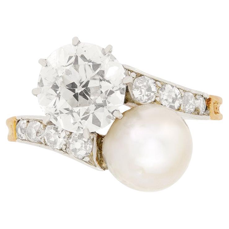 Late Victorian 1.70ct Diamond and Pearl Two Stone Twist Ring, c.1900s