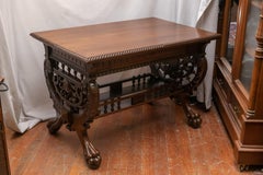 Late Victorian Aesthetic Period Carved Walnut Library Table with Claw Feet