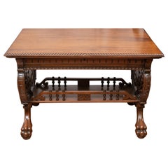 Antique Late Victorian Aesthetic Period Carved Walnut Library Table with Claw Feet