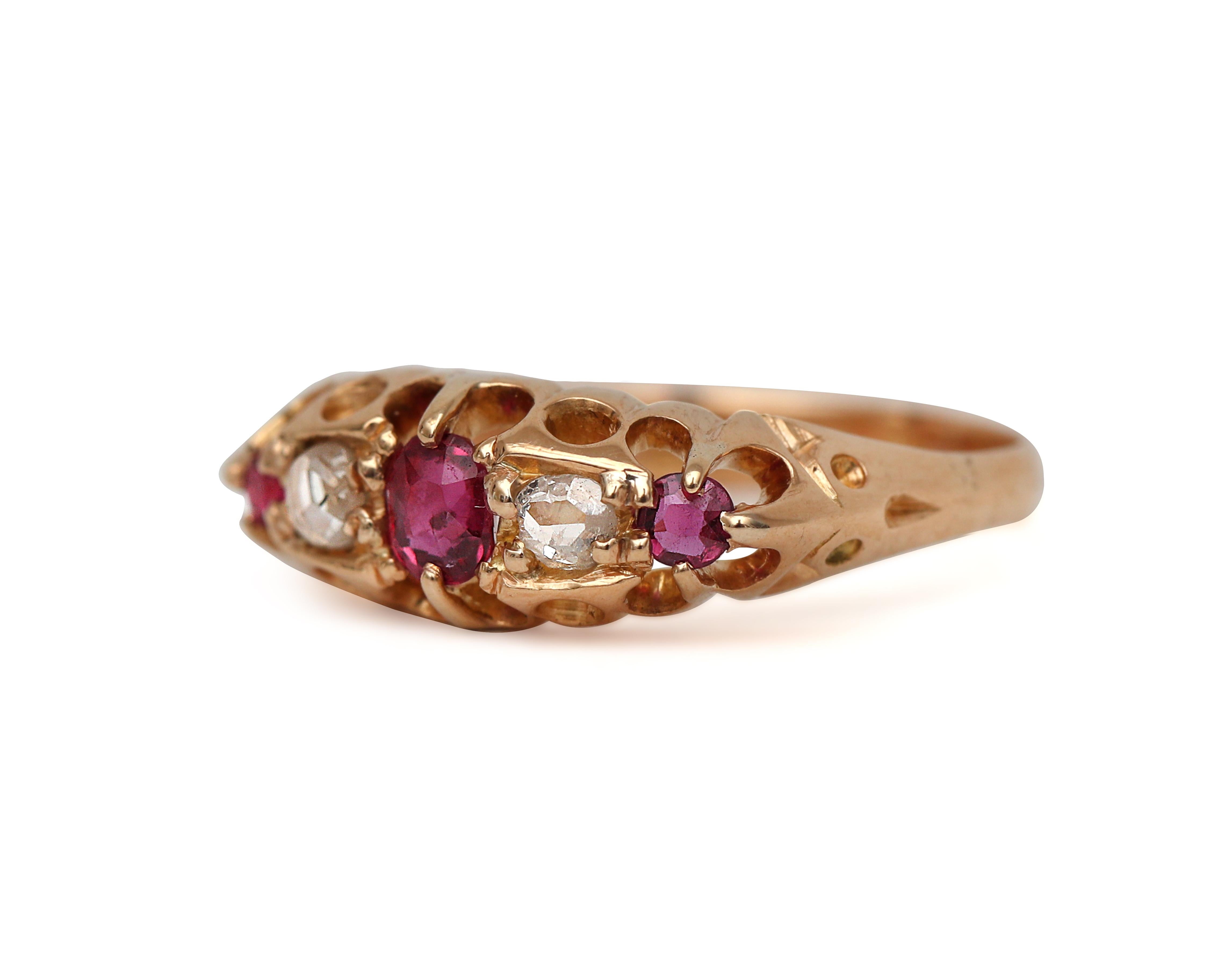 This is an exquisite example of a victorian color stone ring, featuring intense engraving details that lead to a center natural ruby surrounded by period correct old cut diamonds. The Chester British proof marks show this beauty was created in 1905!