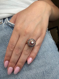 Anello tardo-vittoriano (1880-1900 circa) con rubino e zaffiro e diamanti in C.K. 18