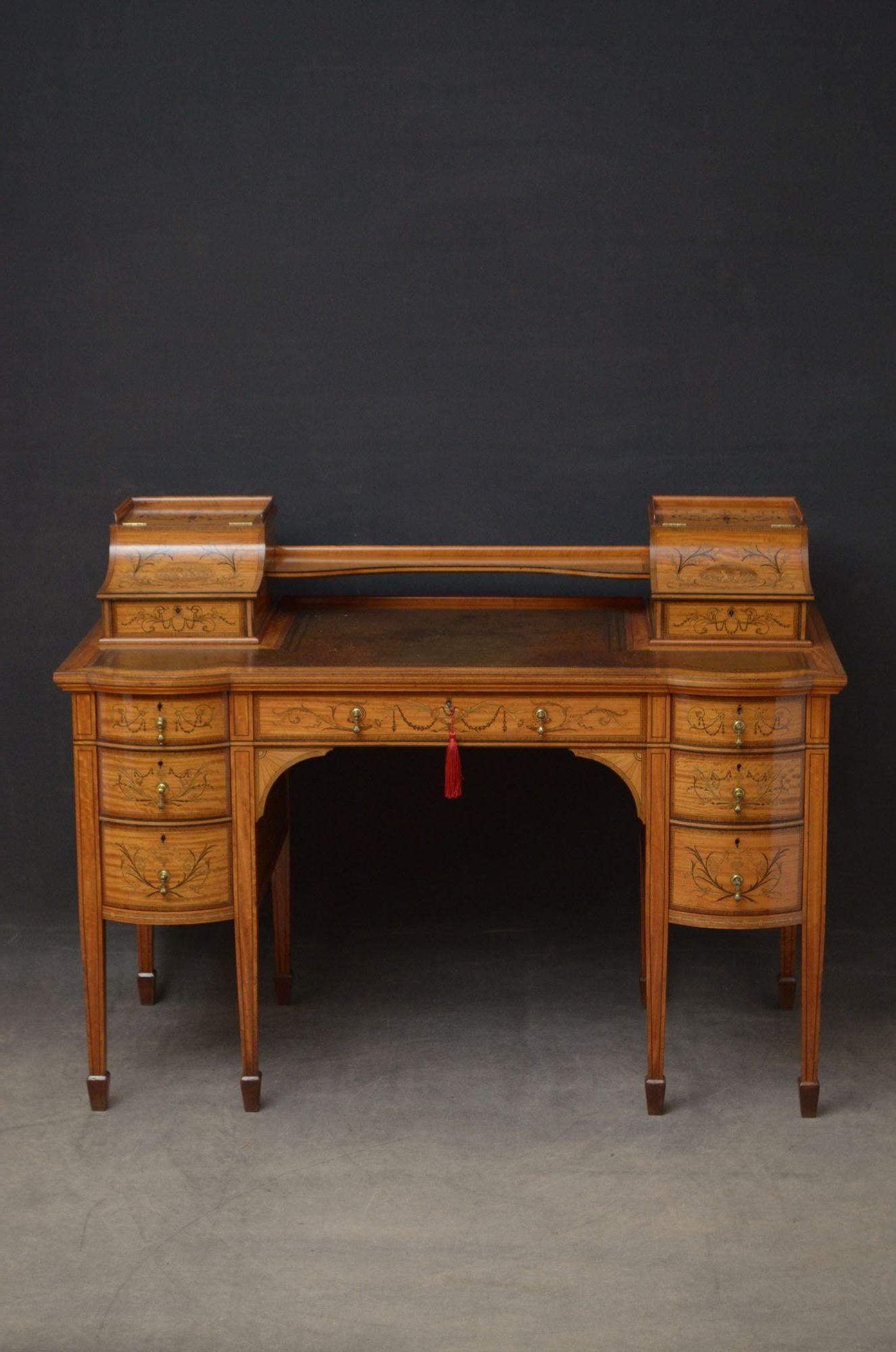 Sn5033 Exceptional quality Sheraton Revival satinwood and marquetry desk attributed to Edwards and Roberts, having original tooled leather writing surface flanked by two floral inlaid boxes, enclosing drawers with pen tray and letter compartments