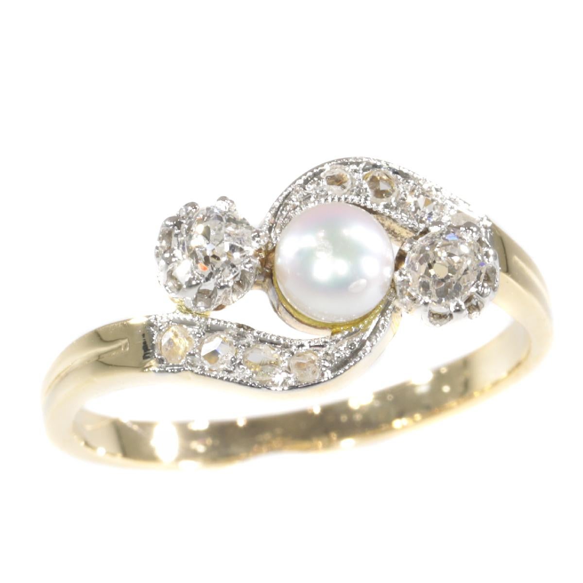 Late Victorian Diamond and Pearl Cross Over Engagement Ring, 1900s For Sale 5