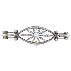 Late Victorian Diamond and Pearl Panel Bracelet in 15 Carat Gold and Silver