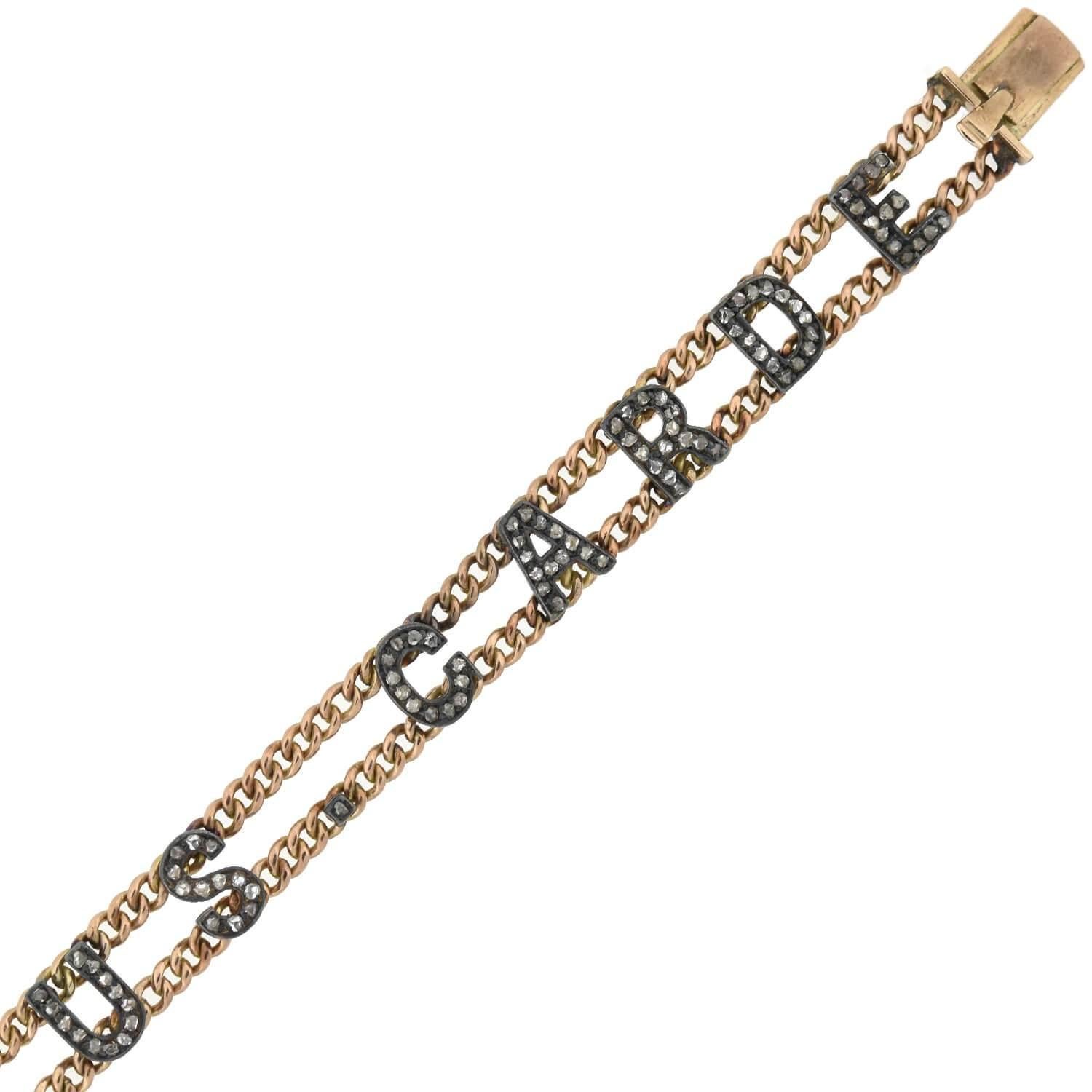 A stunning and unique diamond link bracelet from the Late Victorian (ca1900) era! This fabulous piece is crafted in 18kt rose gold and sterling silver, and displays a bold yet elegant design. The bracelet features 13 sterling links which spell out