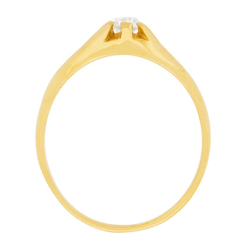 This beautiful solitaire ring has an old cushion cut diamond, weighing 0.40 carats. The single stone boasts a colour grade of G and clarity of VS which are wonderfully highlighted in the handmade band and shank. Made of 18 carat yellow gold, the