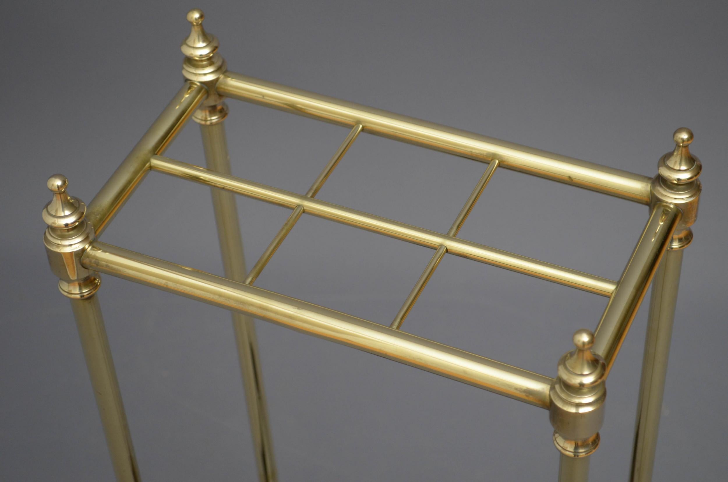 Sn5035, late Victorian / Edwardian brass stick stand, having 6 sections for umbrellas and walking sticks with finials and cast iron base, all in fantastic condition throughout, ready to place at home, c1900

Measures: H 25.5