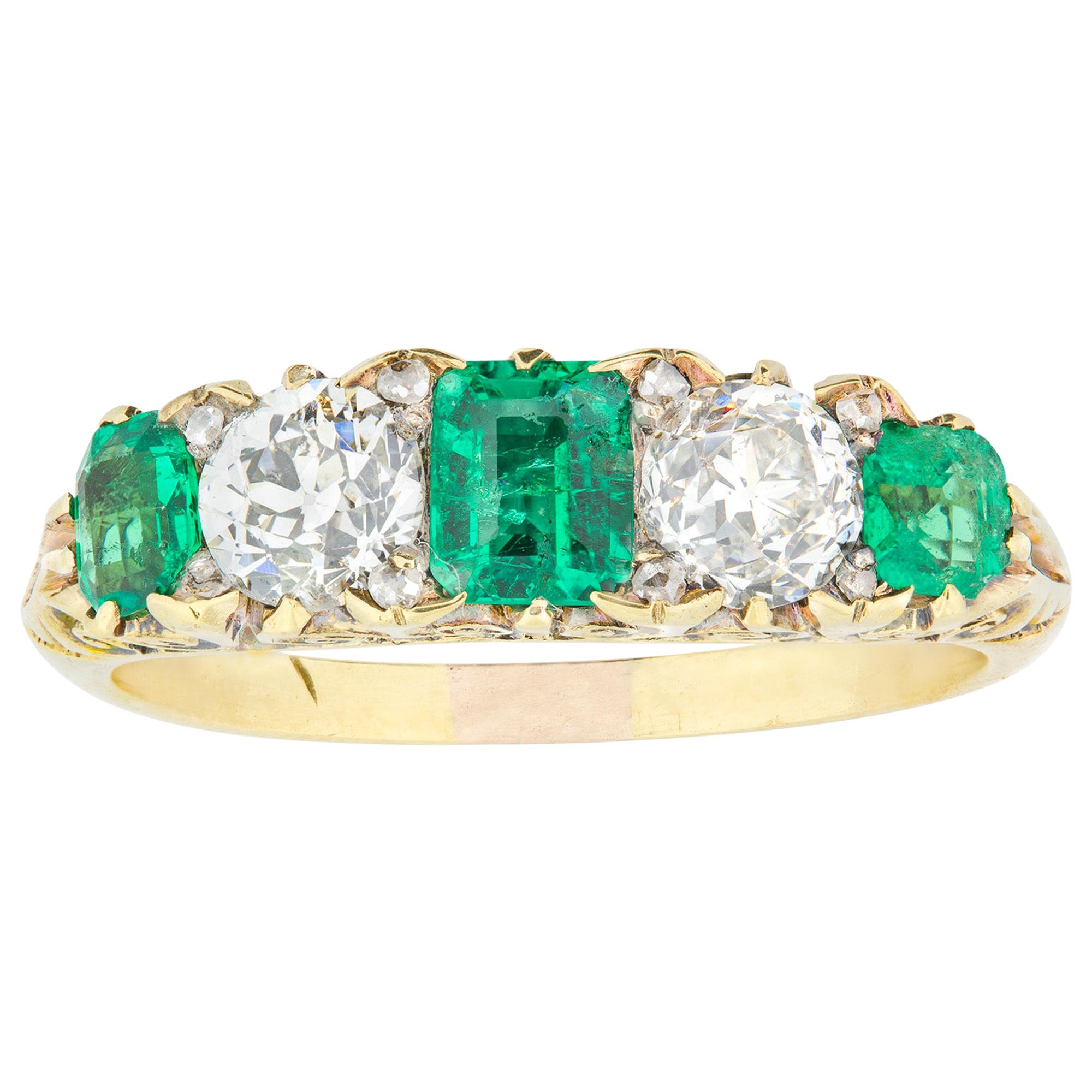 Late Victorian Emerald and Diamond Carved Half Hoop Ring