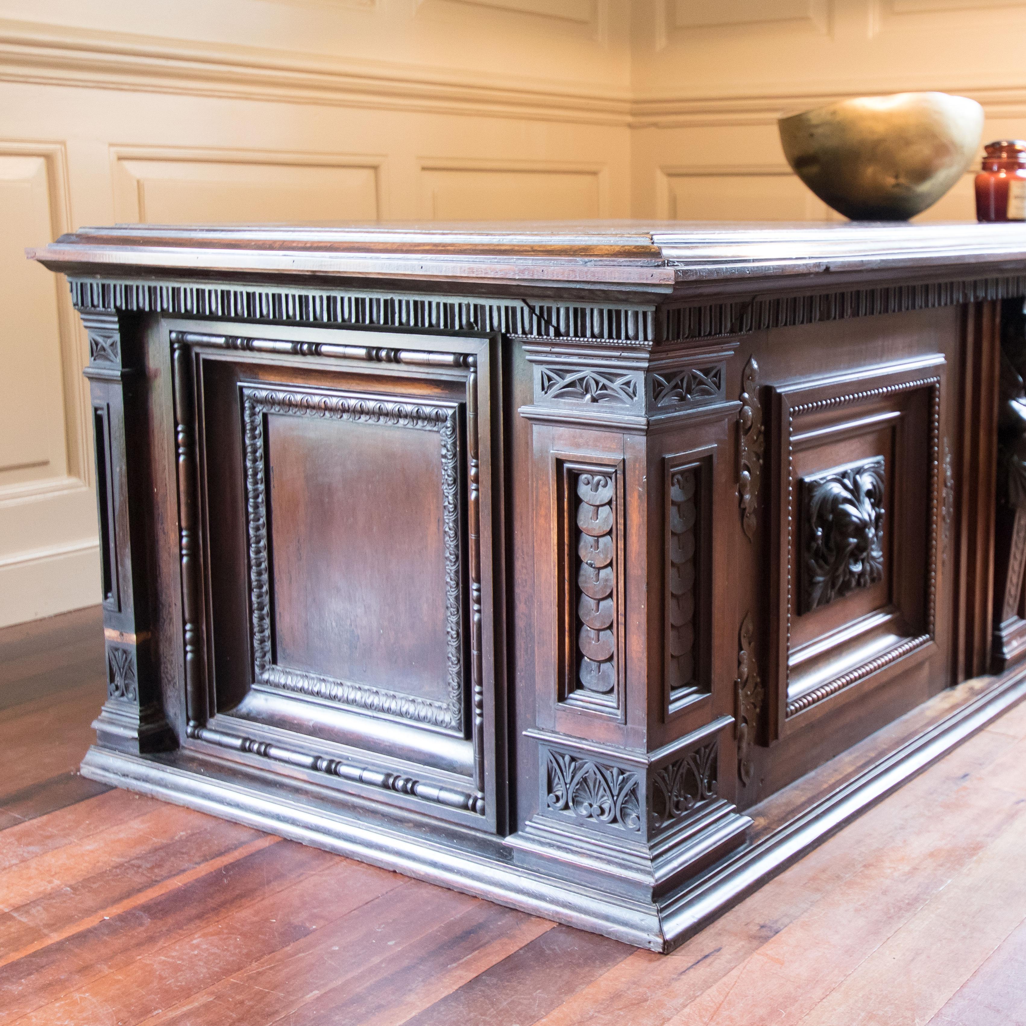 This is a very exciting late Victorian find. Believed to be English walnut with hand carved female pilaster and green man detailing. Quite an exceptional piece with a variety of uses in the modern home. It would make an incredible side cabinet, with