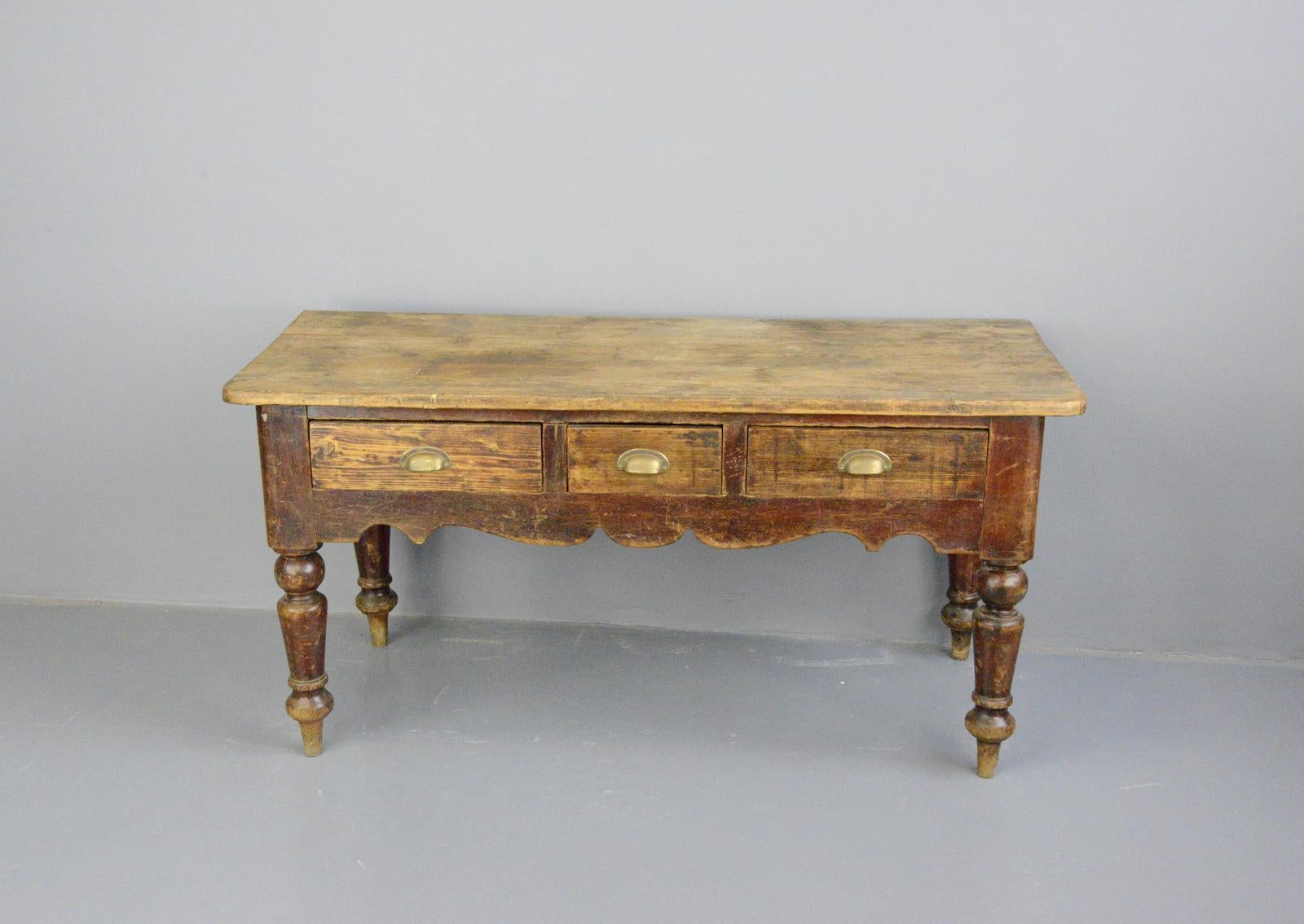 Late Victorian Florists table, 
- Beautifully worn pine top
- Original worn red paint
- Turned legs
- 3 drawers with solid brass cup handles
- English, 1900
- Measures: 154 cm long x 65 cm deep x 77 cm tall.

Condition report:

All the