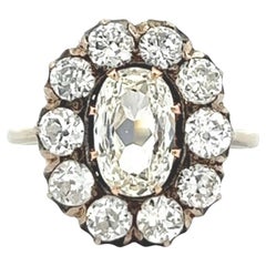Late Victorian GIA 1.03 Carats Oval Cut Diamond White Gold Cluster Ring