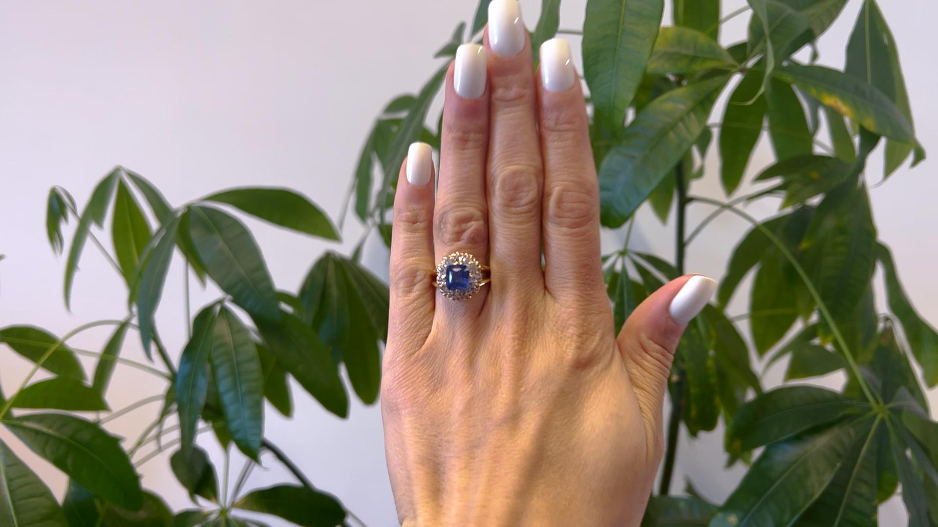 One Late Victorian GIA 3.33 Carat Ceylon Sapphire and Diamond 14k Gold Cluster Ring. Featuring one GIA cushion cut sapphire of 3.33 carats, accompanied with GIA #2235076082 stating the sapphire is Ceylon (Sri Lanka) origin. Accented by 11 old
