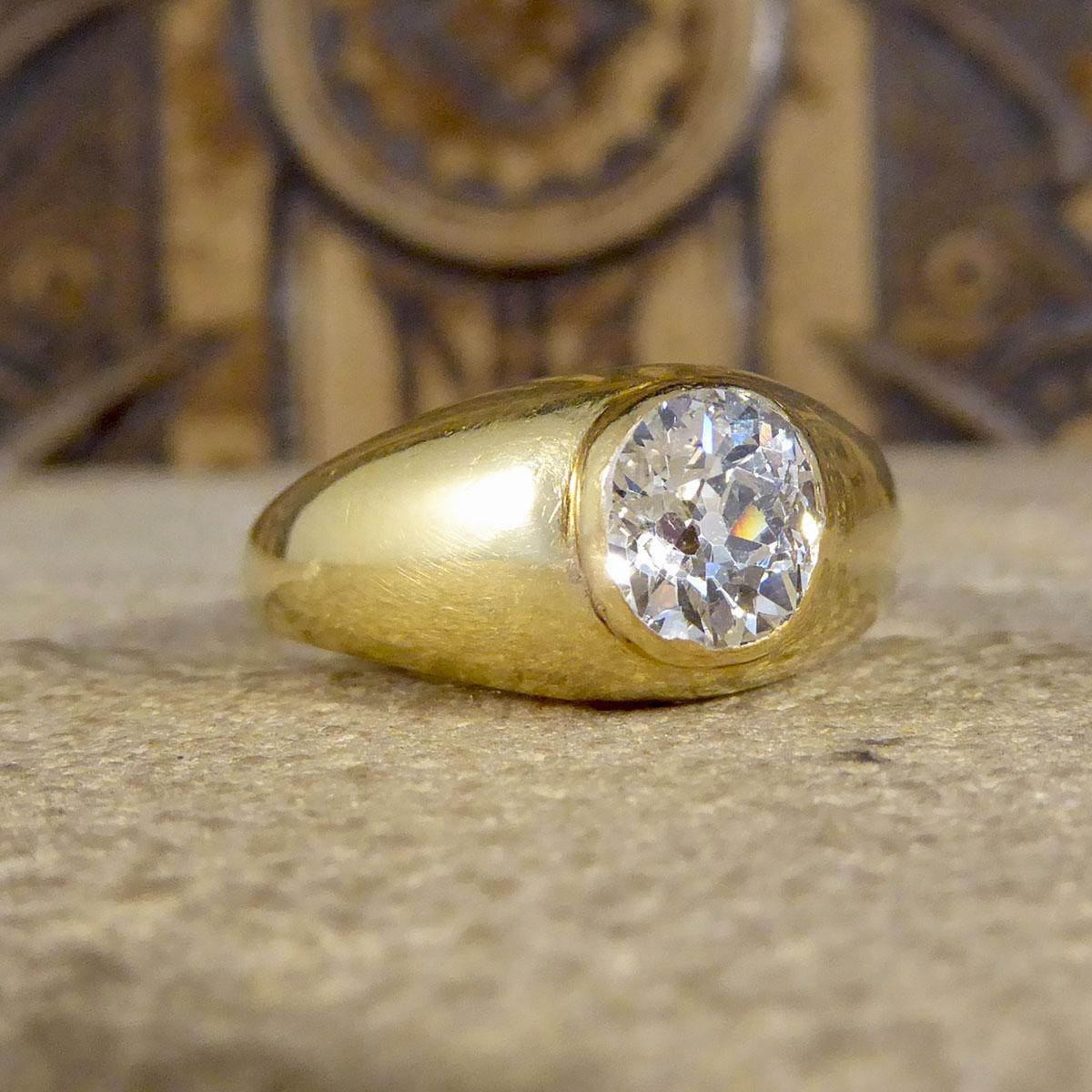 This gorgeous gypsy signet ring has a Old Cushion Cut Diamond in the setting weighing 0.85ct in a rub over setting. It has been crafted in the Late Victorian era with 18CT stamp on the inner band. A beautiful antique ring with a clear and bright