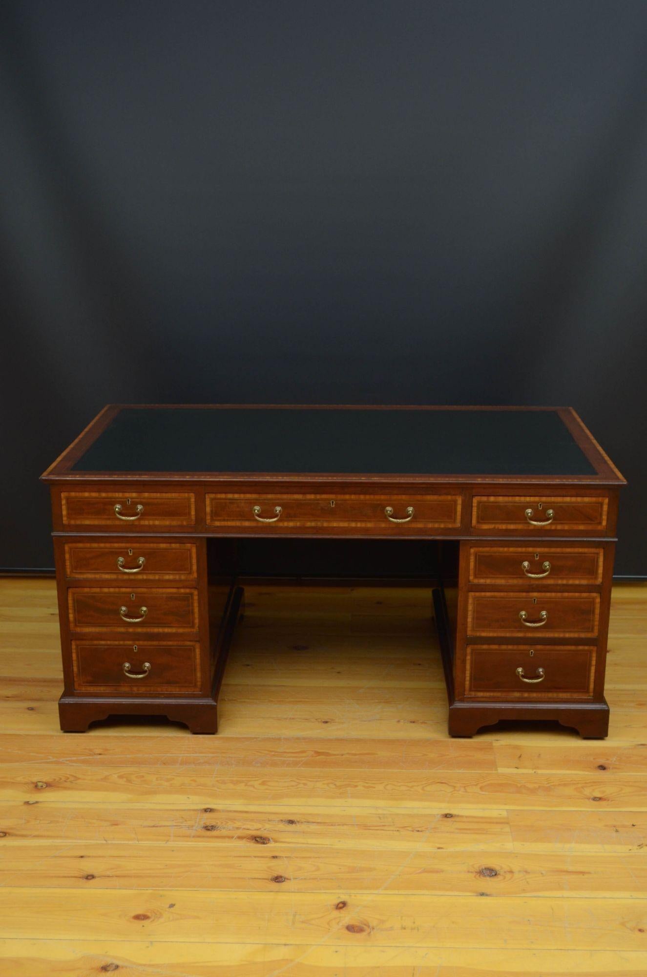 Sn5320 A Late Victorian, mahogany pedestal partners desk with inlaid sides, having original black leather to inlaid top above a centre drawer flanked by further satinwood inlaid drawers and panelled cupboard doors to opposite side, all fitted with