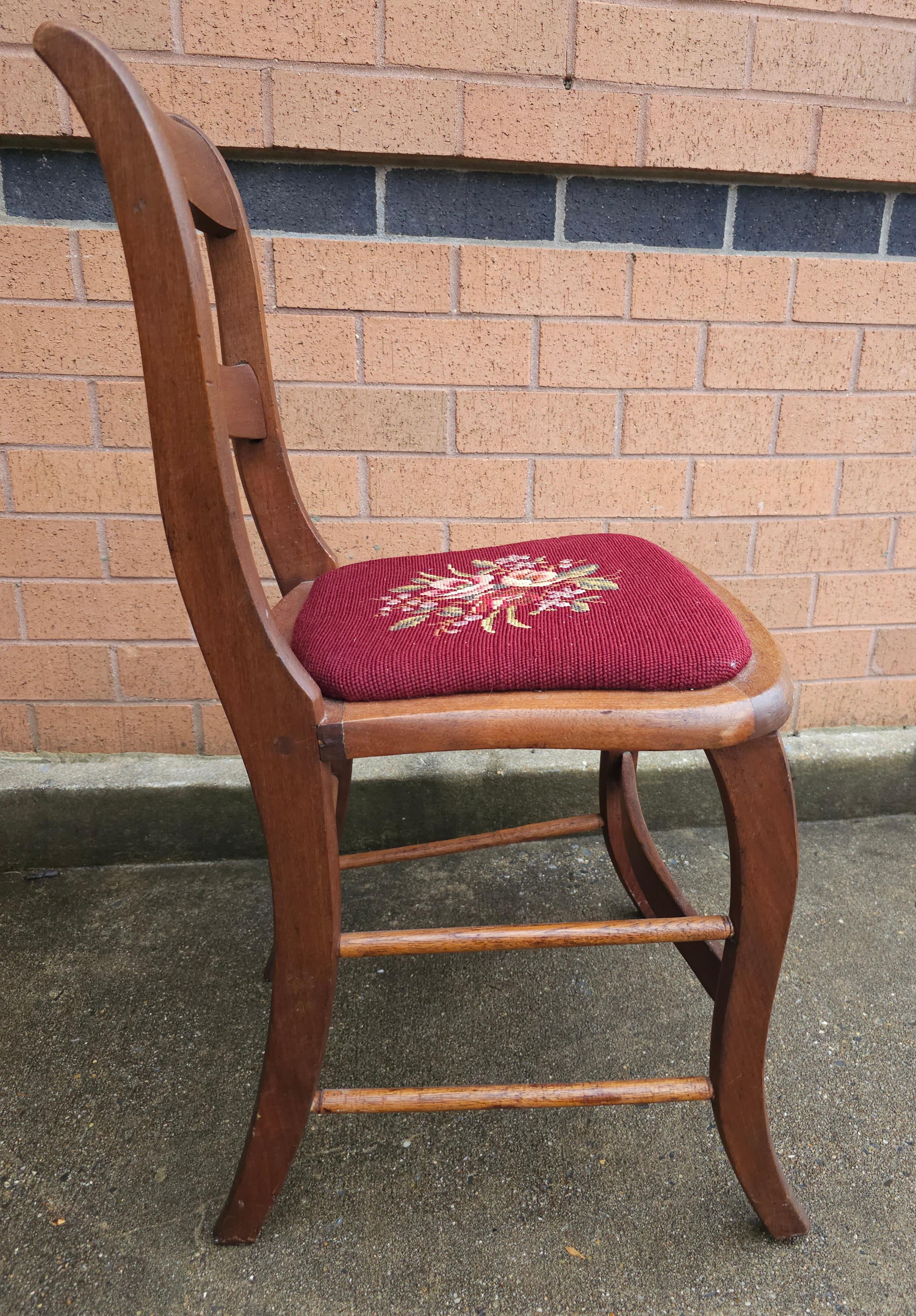 A Late Victorian Mahogany Ladder Back and Needlepoint Upholstered Side Chair. Meaures 17