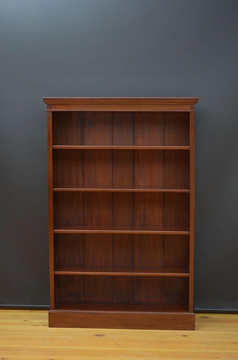 Sn5222 late Victorian walnut open bookcase of simple design, having moulded top above five height adjustable shelves (four on the photos), all standing on plinth base. This antique bookcase has been sympathetically restored and is ready o place at