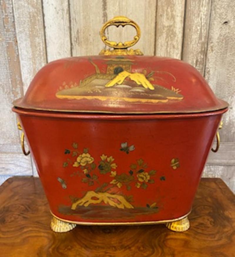Late Victorian :Painted tole coal scuttle
Lovely painted images of Asian scenes with lion head handles. 
Measures: 18.5