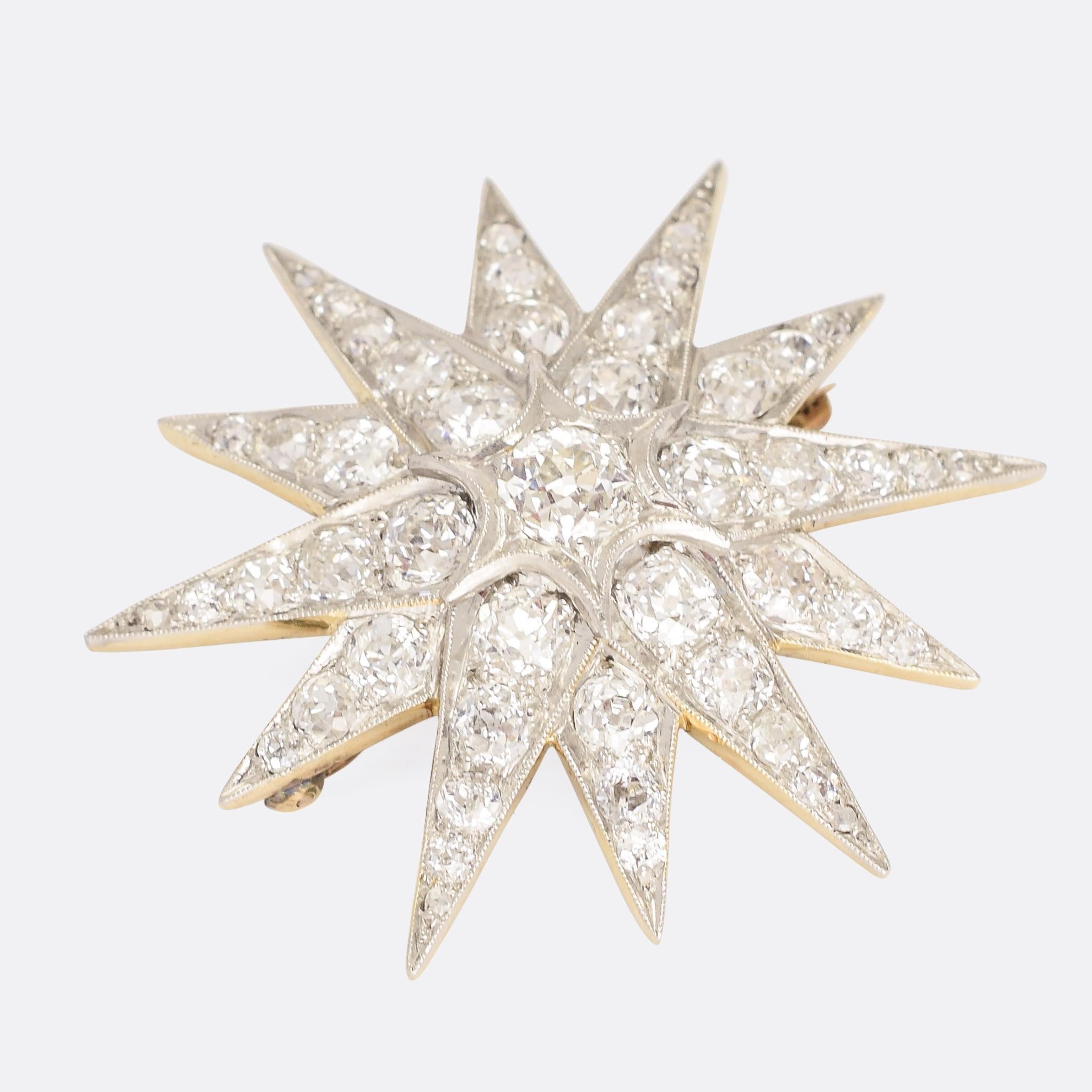 A stunning late Victorian diamond star brooch dating from the turn of the (20th) Century. It's set with 4.75 carats of icy old mine cut diamonds, mounted in beautifully worked platinum settings with fine millegrain detailing to the edges. The