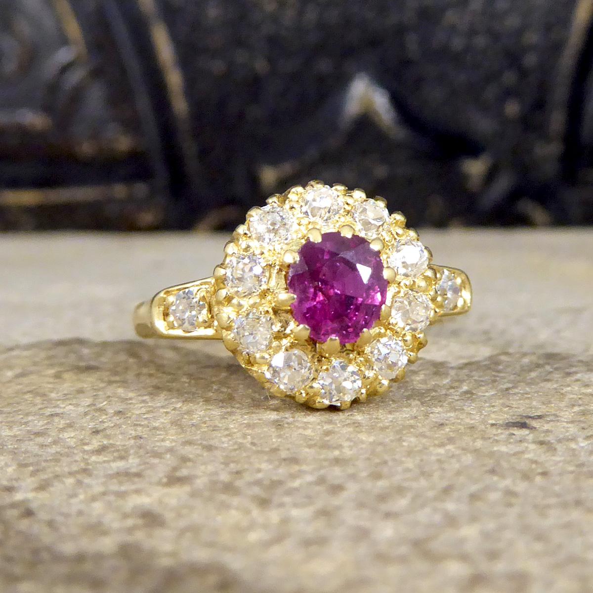 A classic Late Victorian designed ring crafted in C1880 featuring a Ruby in the centre weighing 0.41ct with small nibbles under one claw in keeping with the age of the piece. The rich and vibrant Ruby has a surround of Old Chunky European Cut